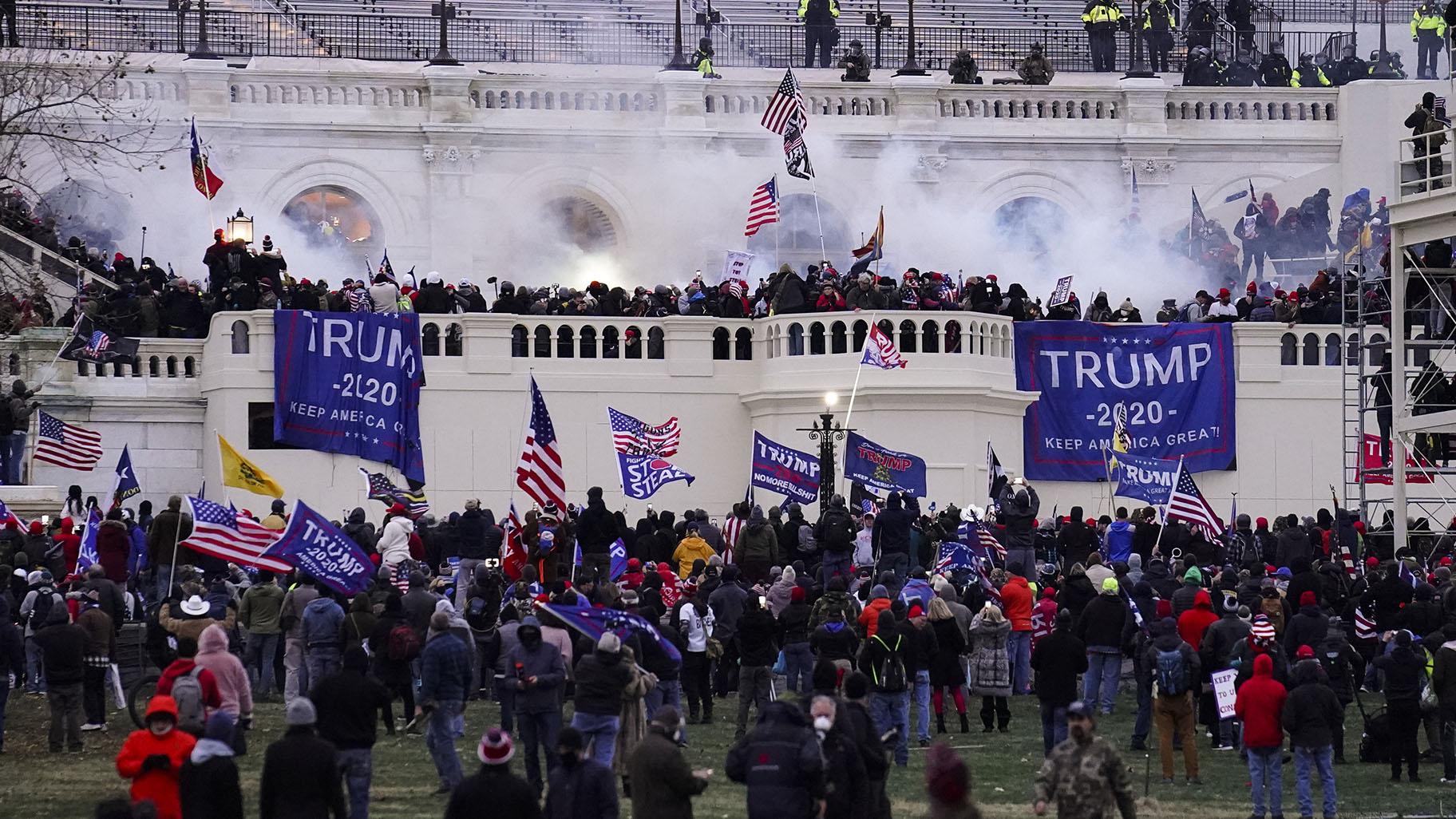Violent insurrectionists loyal to President Donald Trump storm the Capitol, Jan. 6, 2021, in Washington. (AP Photo / John Minchillo, File)