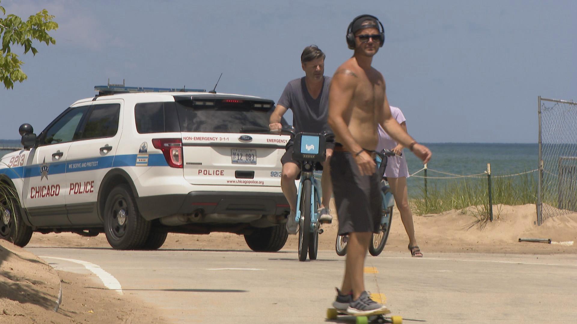 Chicagoans try to beat the heat along the lakefront trail in early July. (WTTW News)