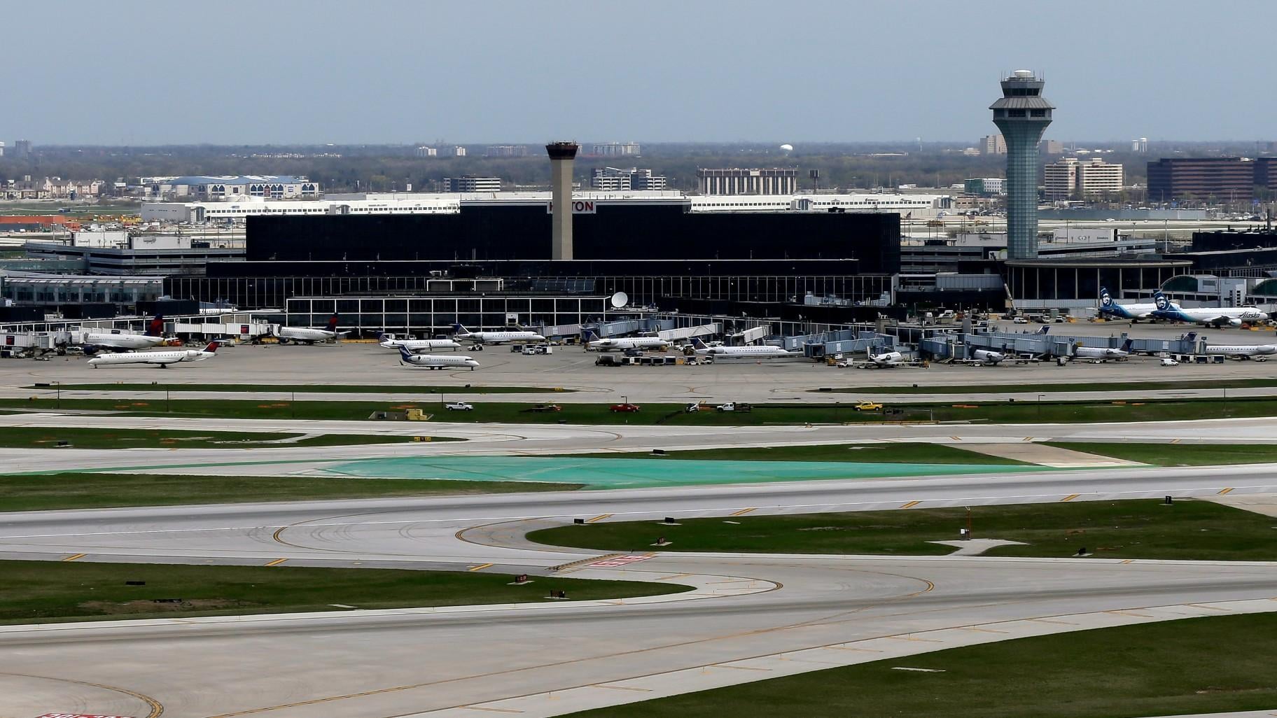 The O'Hare International Airport terminals are seen from the south air traffic control tower in Chicago, April 22, 2019. (AP Photo/Kiichiro Sato, File)