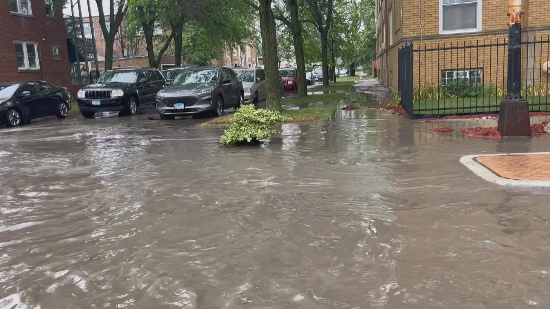 Flooded streets in Chicago are pictured on July 2, 2023. (Paris Schutz / WTTW News)
