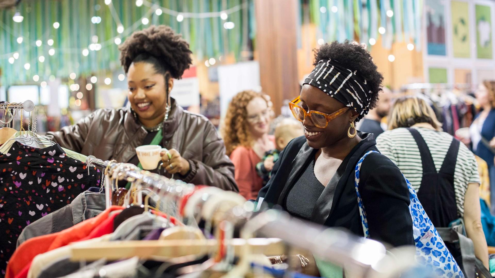 Attendees shop the racks at a previous clothing swap. (Bernadette Aguilar) Attendees shop the racks at a previous clothing swap. (Bernadette Aguilar)