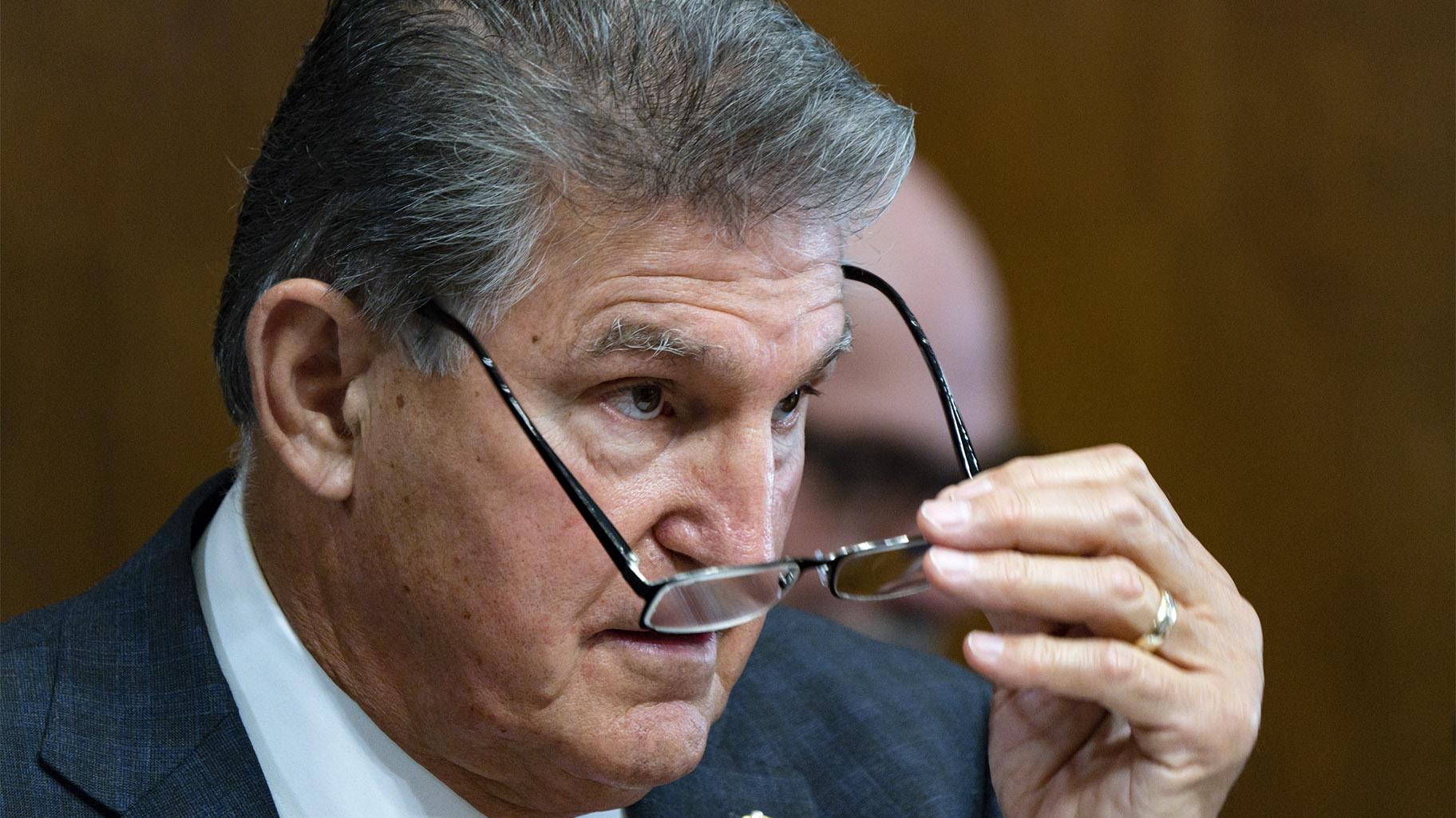 Sen. Joe Manchin, D-W.Va., a key holdout vote on President Joe Biden's domestic agenda, chairs a hearing of the Senate Energy and Natural Resources Committee, at the Capitol in Washington, Tuesday, Oct. 19, 2021. (AP Photo / J. Scott Applewhite)