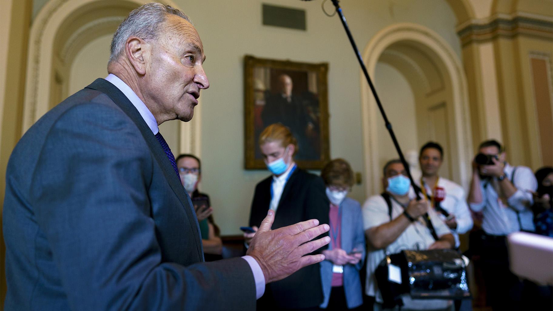 Senate Majority Leader Chuck Schumer, D-N.Y., updates reporters on the infrastructure negotiations between Republicans and Democrats, at the Capitol in Washington, Wednesday, July 28, 2021. (AP Photo / J. Scott Applewhite)