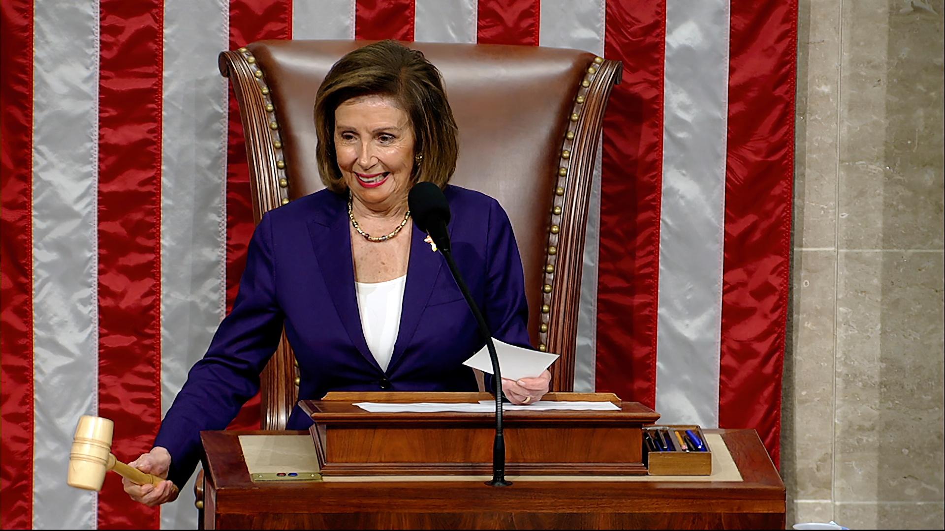 In this image from House Television, House Speaker Nancy Pelosi of Calif., announces final passage of the bill with protections for same-sex marriages, on the House Floor on Thursday, Dec. 8, 2022, in Washington. The bipartisan legislation, which passed 258-169, would also protect interracial unions by requiring states to recognize legal marriages regardless of “sex, race, ethnicity, or national origin.” (Senate Television via AP)
