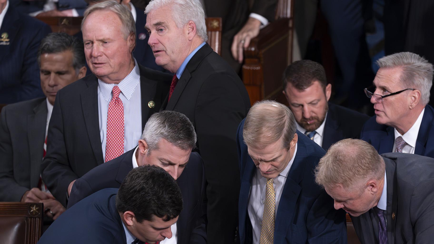 Rep. David Joyce, R-Ohio, upper left, confers with House Majority Whip Tom Emmer, R-Minn., as Rep. Jim Jordan, R-Ohio, center, and former Speaker Kevin McCarthy, R-Calif., far right, tabulate votes as Republicans failed to elect Jordan as speaker, at the Capitol in Washington, Tuesday, Oct. 17, 2023. (AP Photo / J. Scott Applewhite, File)