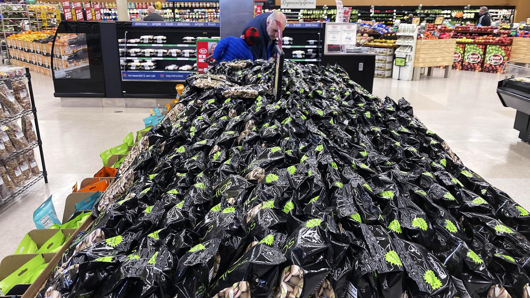 Bags of Pistachios are displayed at a grocery store in Mount Prospect, Ill., on, April 1, 2022. (AP Photo/Nam Y. Huh)