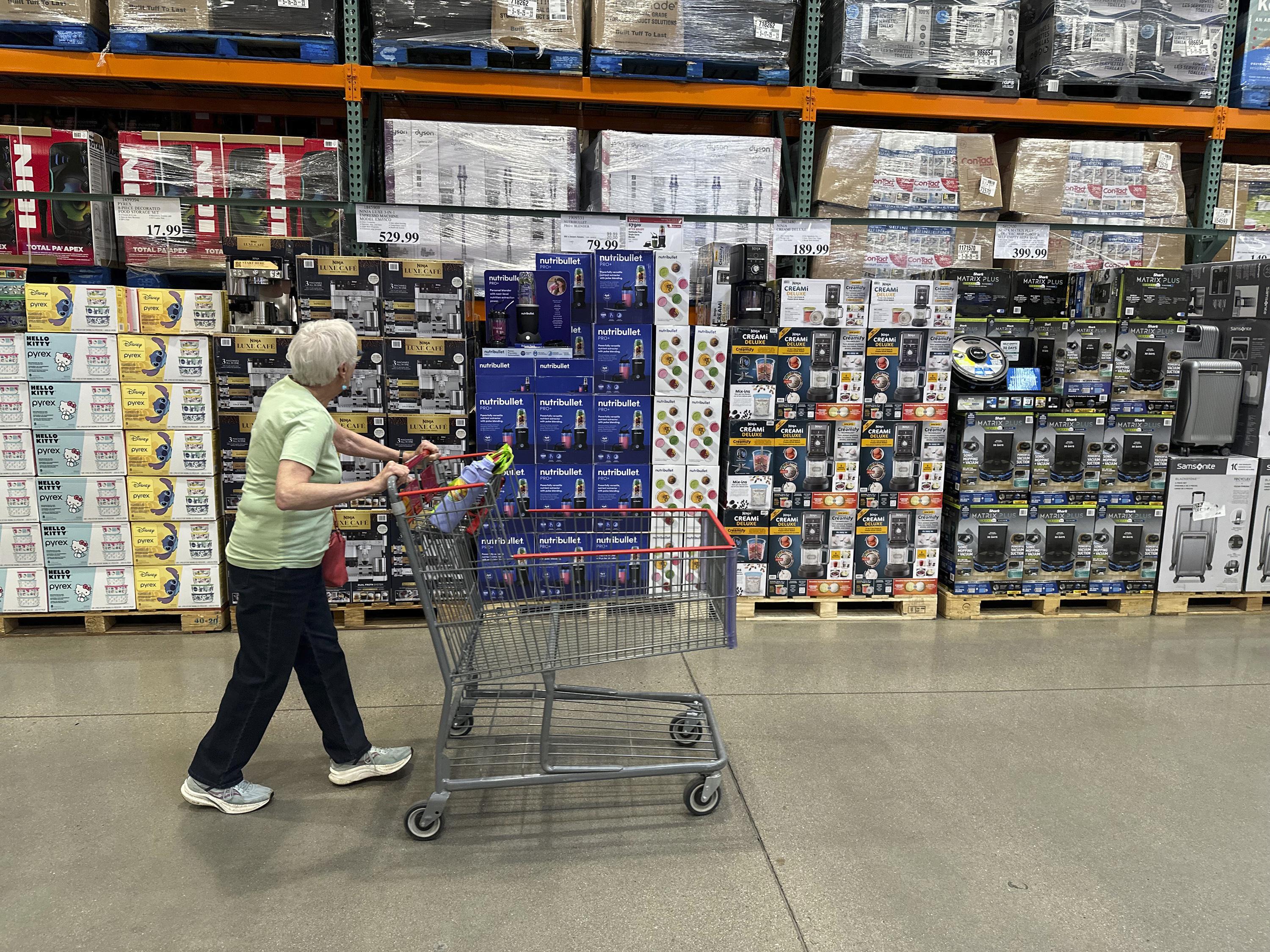 A shopper surveys goods on display in a Costco warehouse Wednesday, May 21, 2025, in Lone Tree, Colo. (AP Photo/David Zalubowski) A shopper surveys goods on display in a Costco warehouse Wednesday, May 21, 2025, in Lone Tree, Colo. (AP Photo/David Zalubowski)