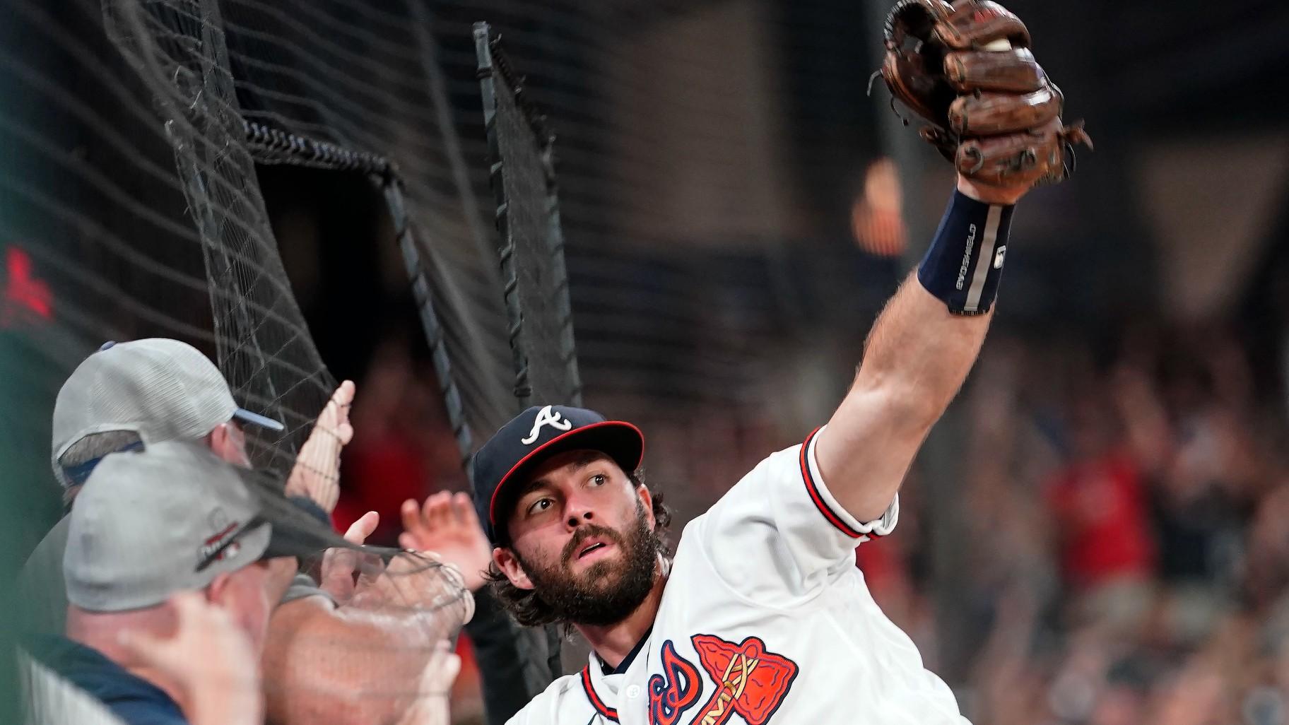 Dansby Swanson catches a ball hit by Philadelphia Phillies’ Kyle Schwarber in the ninth inning of a baseball game Sept. 17, 2022, in Atlanta. (AP Photo / Brynn Anderson, File)