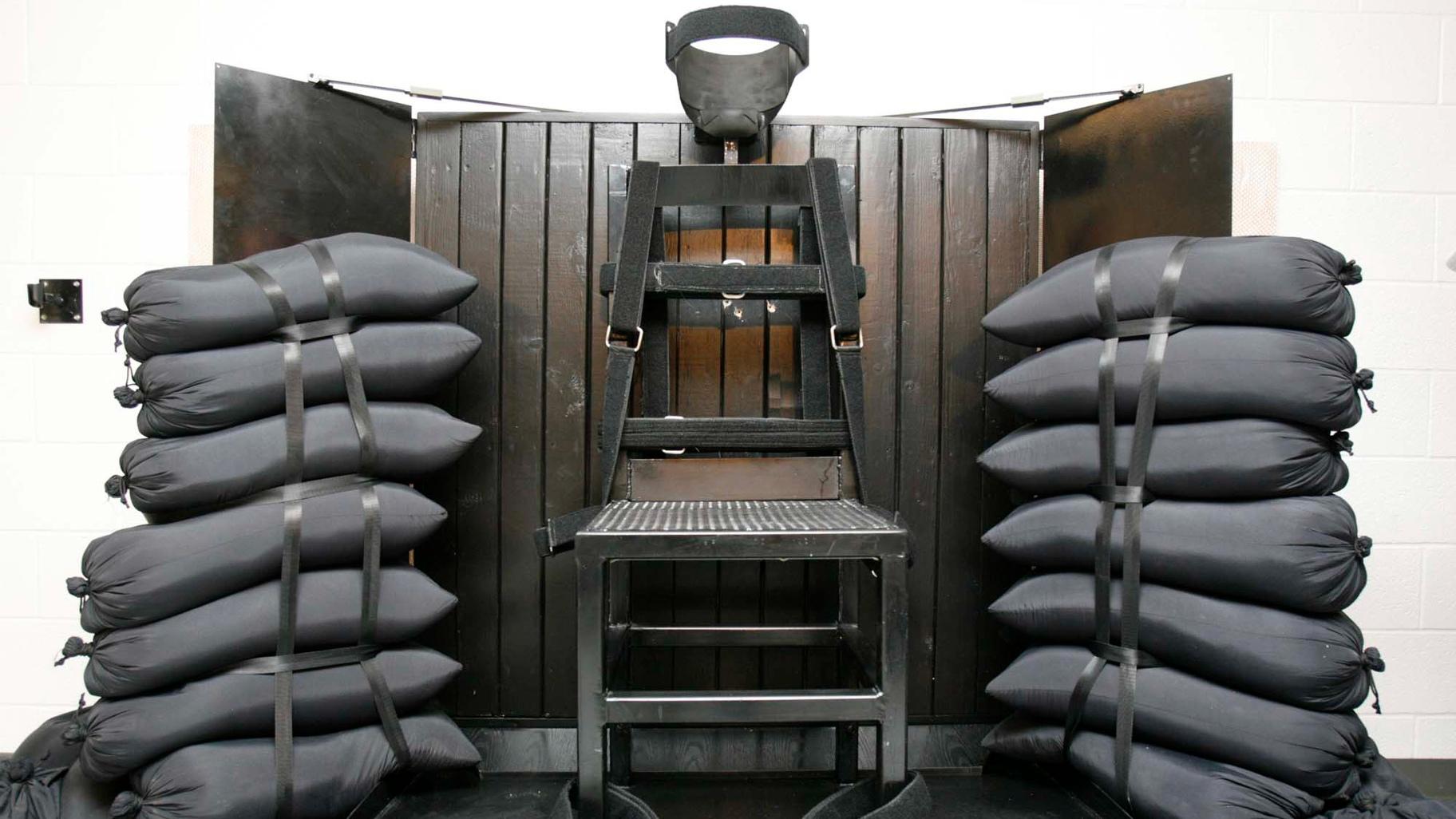 A chair sits in the execution chamber at the Utah State Prison on June 18, 2010, after Ronnie Lee Gardner was executed by firing squad in Draper, Utah. (Trent Nelson / The Salt Lake Tribune via AP, Pool, File)