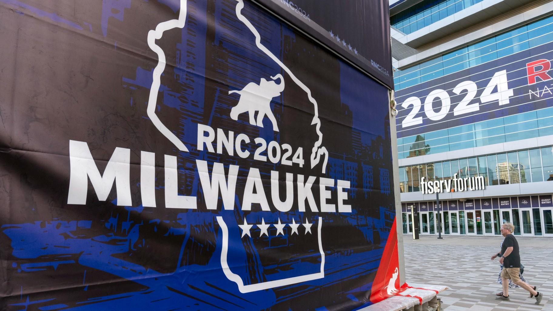 People walk past the Fiserv Forum ahead of the 2024 Republican National Convention, Thursday, July 11, 2024, in Milwaukee. (Alex Brandon / AP Photo)