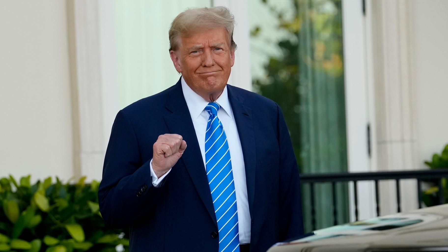 Former President Donald Trump pumps his fist as he arrives for a GOP fundraiser, Saturday, April 6, 2024, in Palm Beach, Fla. (AP Photo / Lynne Sladky)