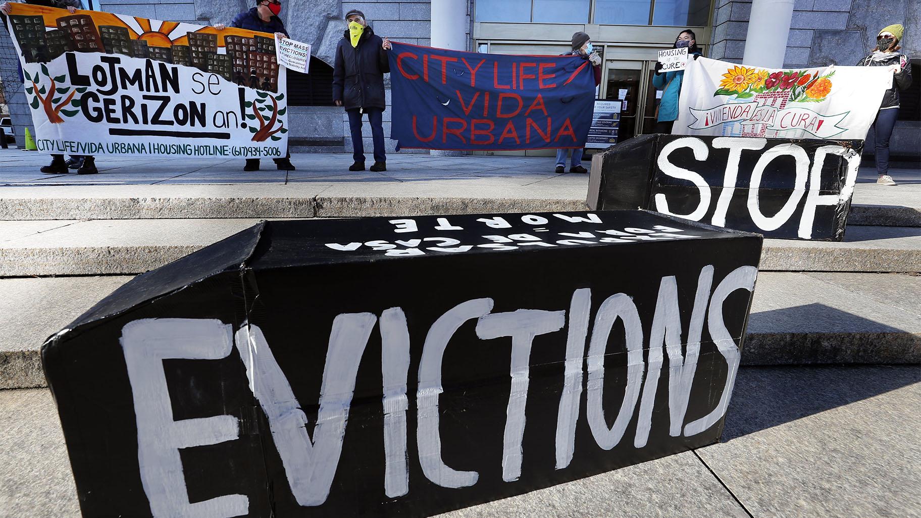 FILE - In this Jan. 13, 2021, file photo, tenants' rights advocates demonstrate in front of the Edward W. Brooke Courthouse in Boston. (AP Photo / Michael Dwyer, File)