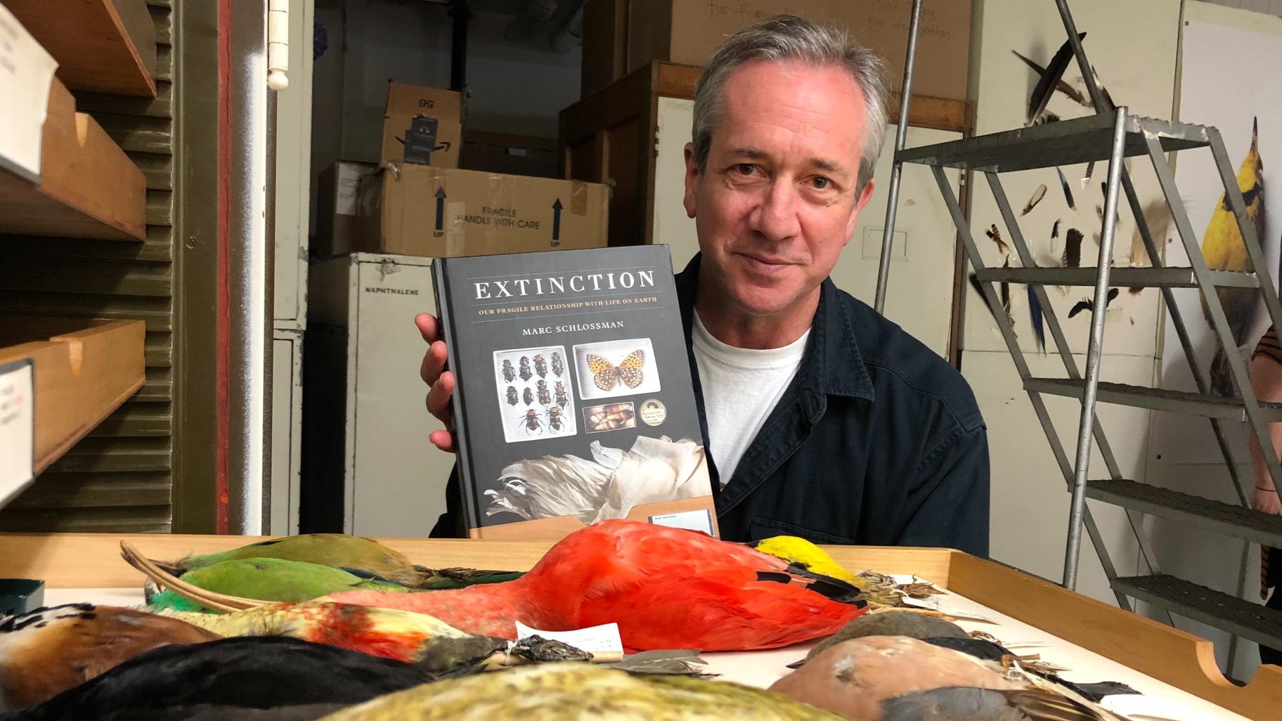 Marc Schlossman, pictured with bird specimens at the Field Museum, Oct. 25, 2022. (Patty Wetli / WTTW News)