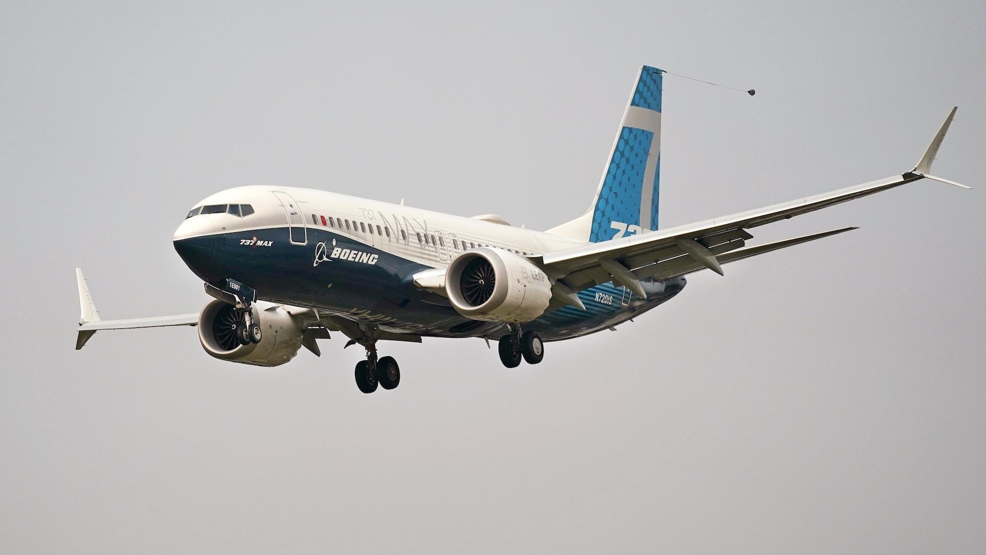 In this Wednesday, Sept. 30, 2020, file photo, a Boeing 737 Max jet, piloted by Federal Aviation Administration Chief Steve Dickson, prepares to land at Boeing Field following a test flight in Seattle. (AP Photo/Elaine Thompson, File)