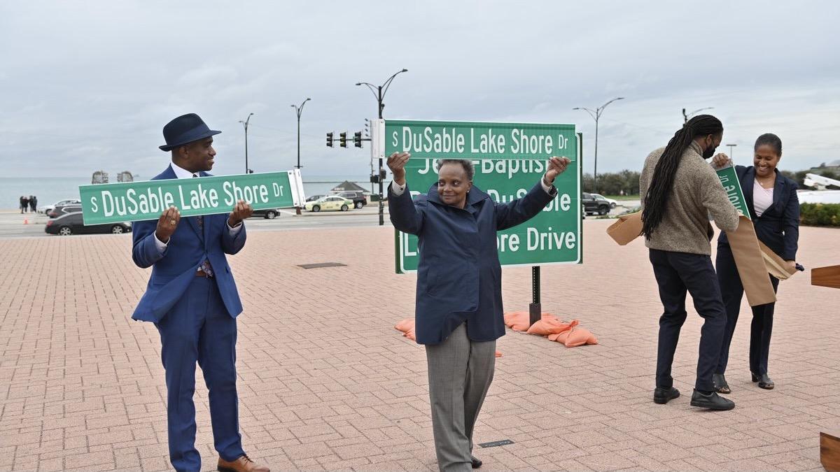 Ald. David Moore (17th Ward) and Mayor Lori Lightfoot, left, celebrate the renaming of Lake Shore Drive to honor Jean-Baptiste Pointe DuSable on Thursday, Oct. 21. (Credit: Chicago's Mayor Office)