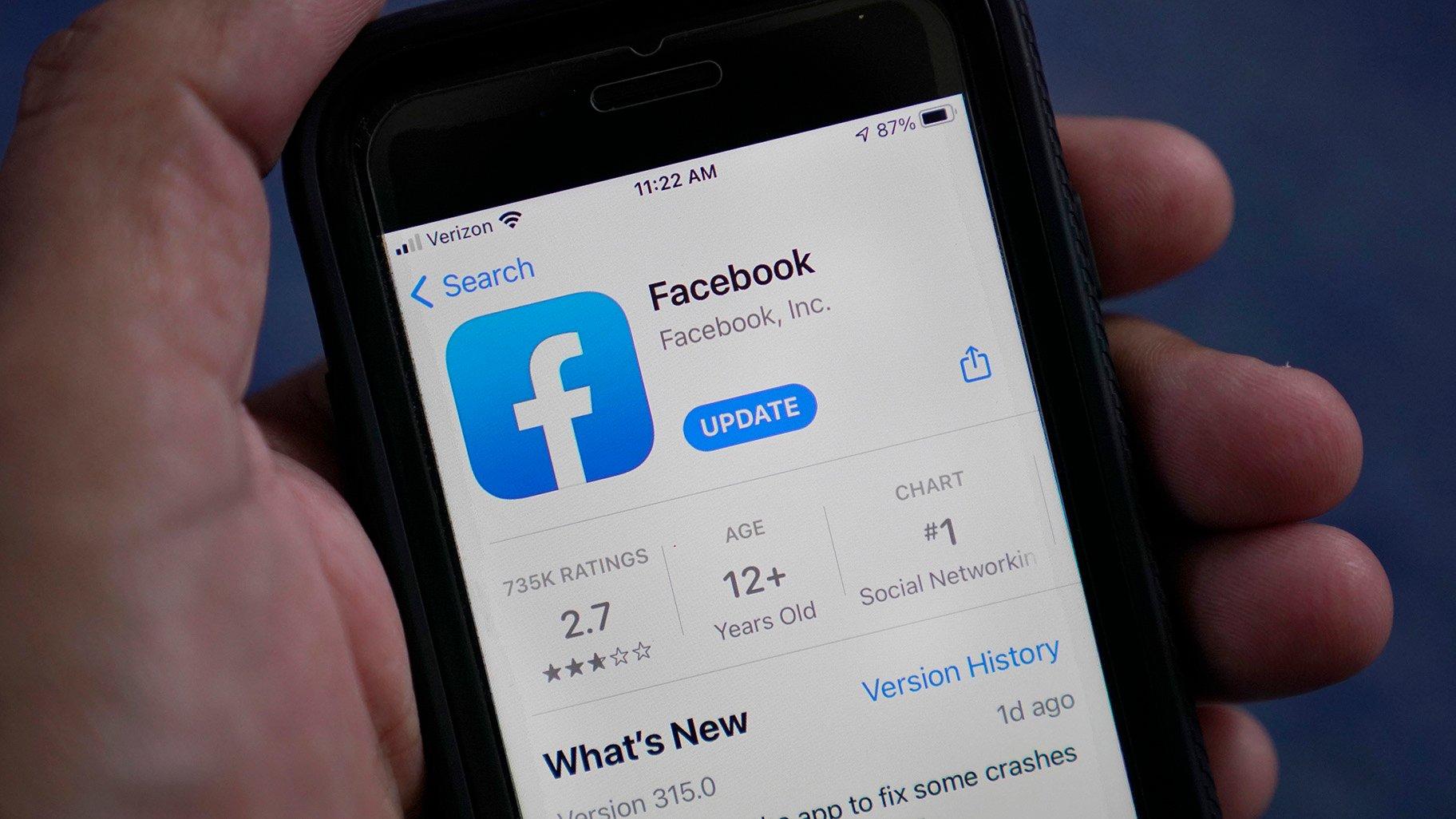 The Facebook app is shown on a smart phone, Friday, April 23, 2021, in Surfside, Fla. (AP Photo / Wilfredo Lee)