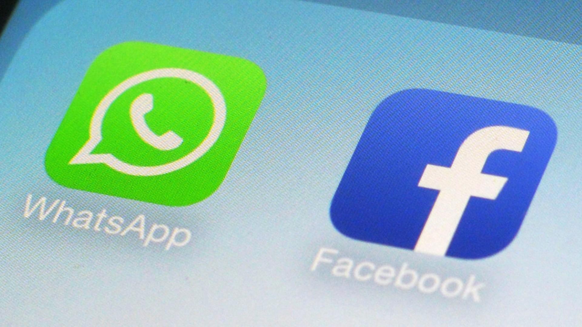 This Feb. 19, 2014, file photo, shows WhatsApp and Facebook app icons on a smartphone in New York. (AP Photo  /Patrick Sison, File)