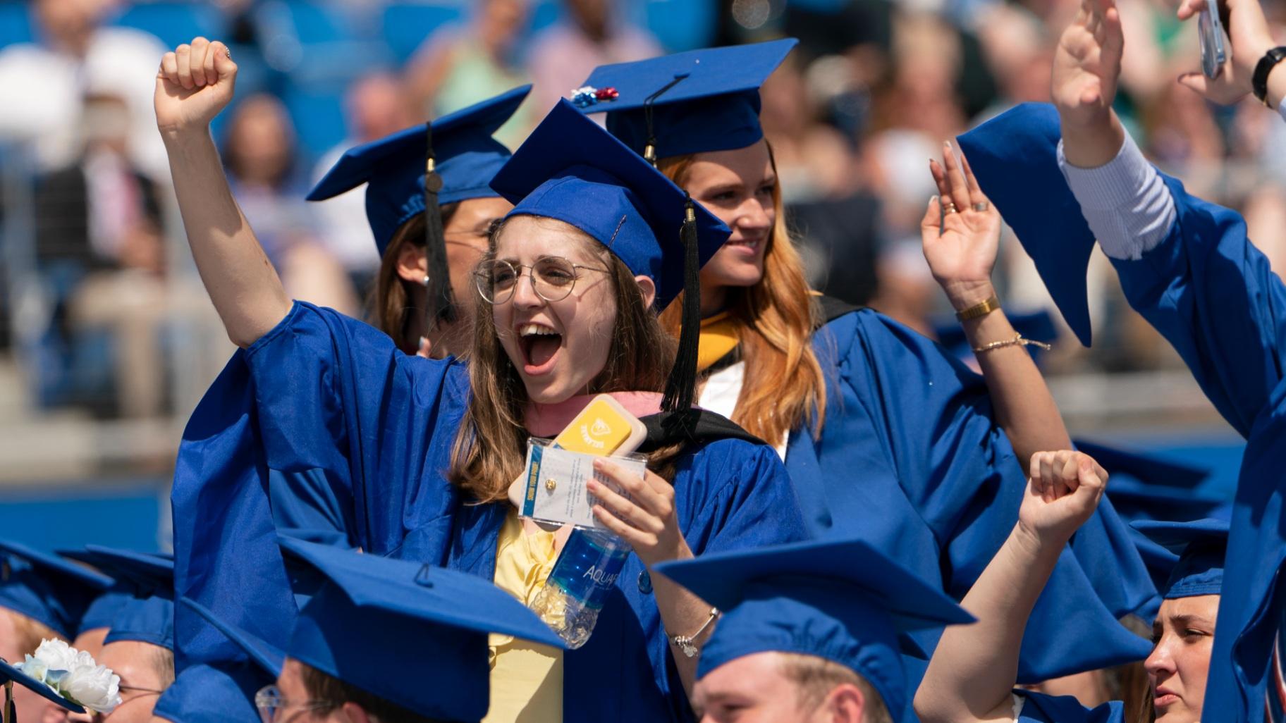 Graduates celebrate during the University of Delaware Class of 2022 commencement ceremony in Newark, Del., on Saturday, May 28, 2022. (AP Photo/Manuel Balce Ceneta)
