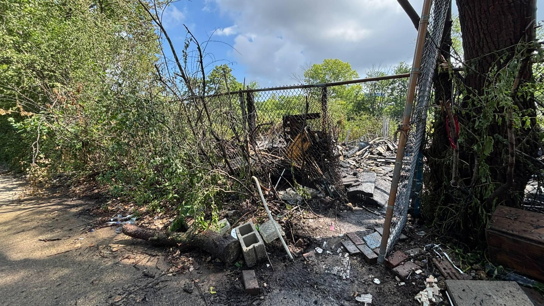 A fire broke out in a homeless encampment along the North Shore Channel on July 28, 2025. (Crystin Immel / WTTW News) A fire broke out in a homeless encampment along the North Shore Channel on July 28, 2025. (Crystin Immel / WTTW News)