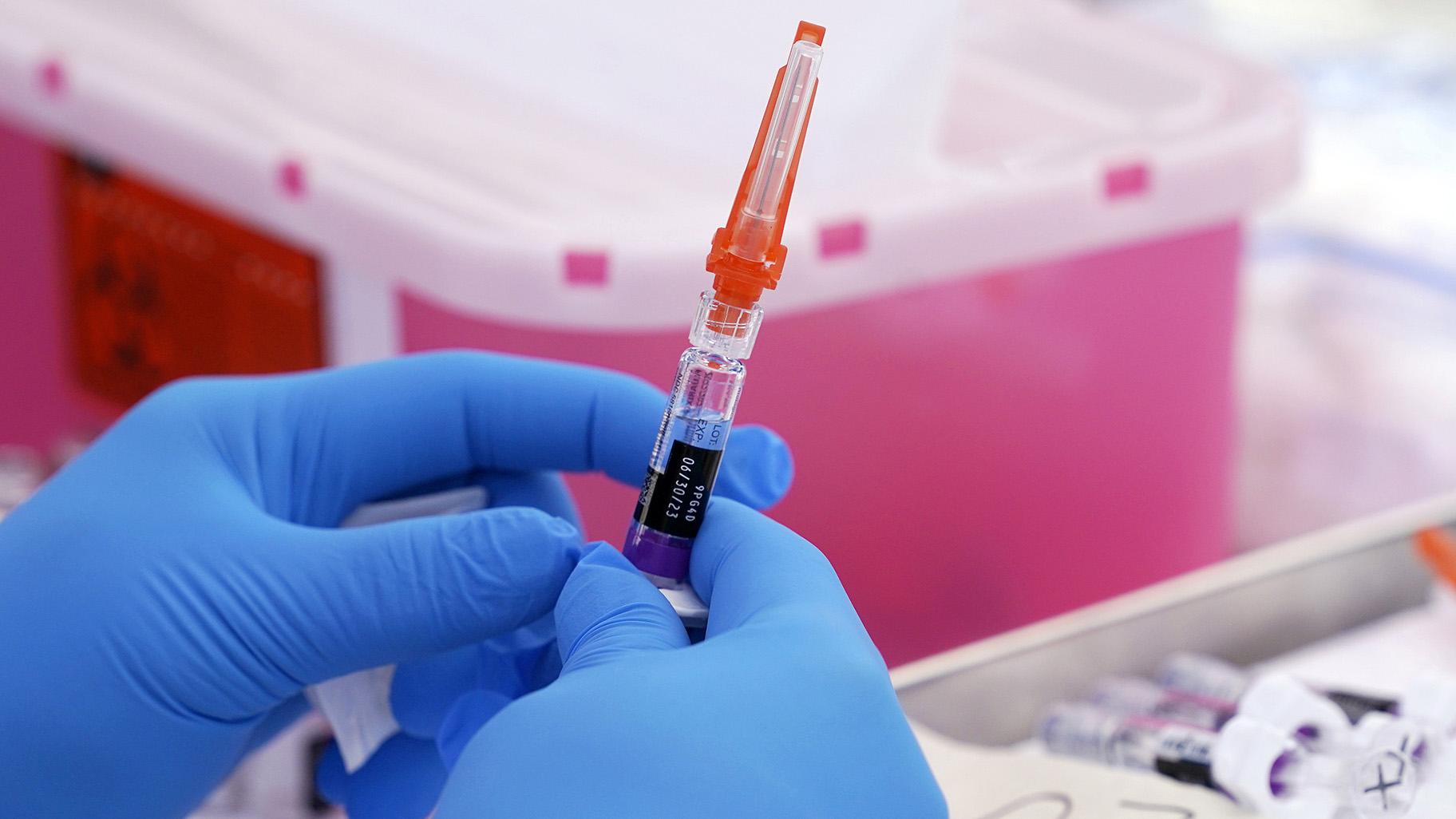 A flu vaccine is readied at the L.A. Care and Blue Shield of California Promise Health Plans’ Community Resource Center where they were offering members and the public free flu and COVID-19 vaccines Friday, Oct. 28, 2022, in Lynwood, Calif. (AP Photo / Mark J. Terrill, File)