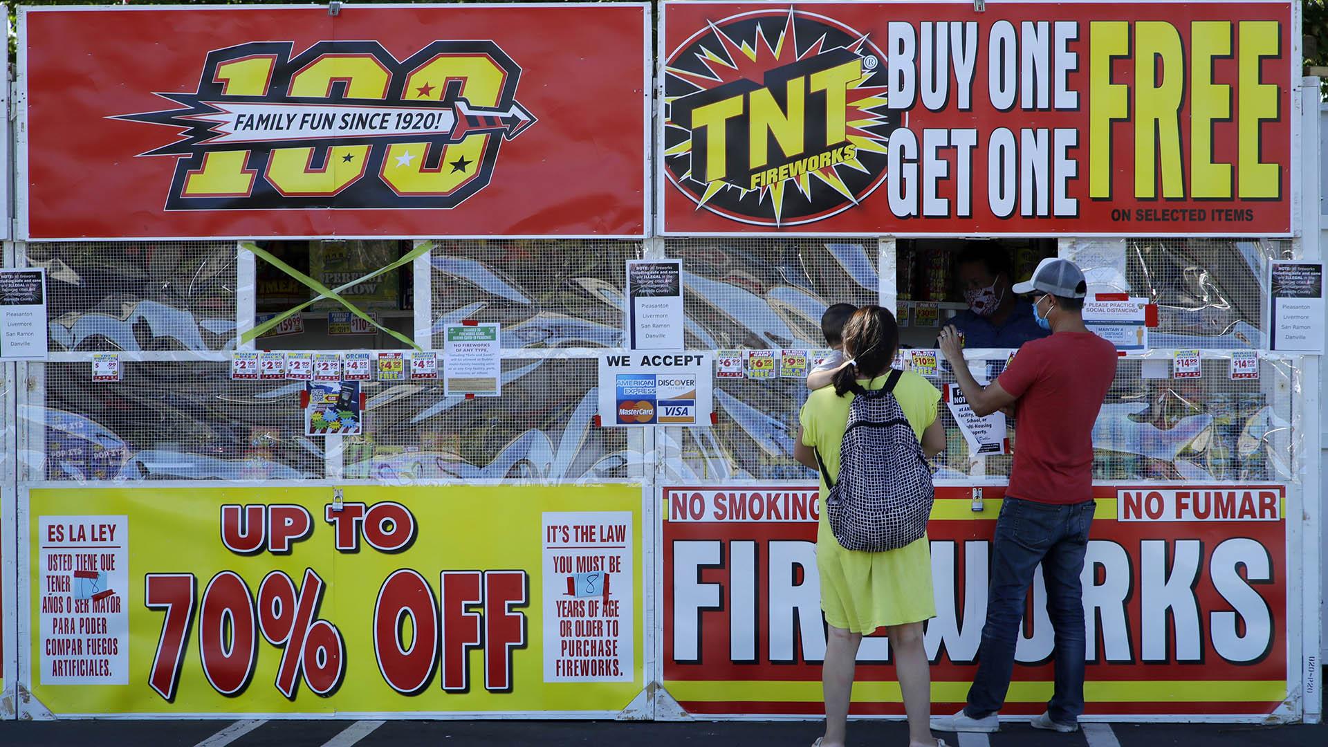  People purchase fireworks on Thursday, July 2, 2020, in Dublin, Calif. (AP Photo / Ben Margot)