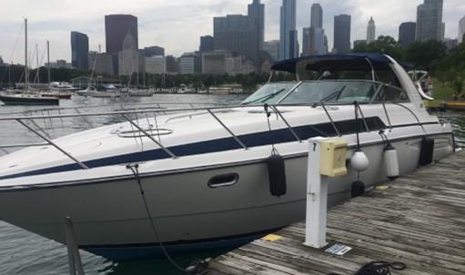 A 40-foot powerboat known as “Sea Hawk” and “Anchorman” allegedly used by Christopher Mike Garbowski to run illegal charter voyages along the Chicago River and Lake Michigan. Garbowski was sentenced this week to one year in federal prison. (U.S. Attorney’s Office)