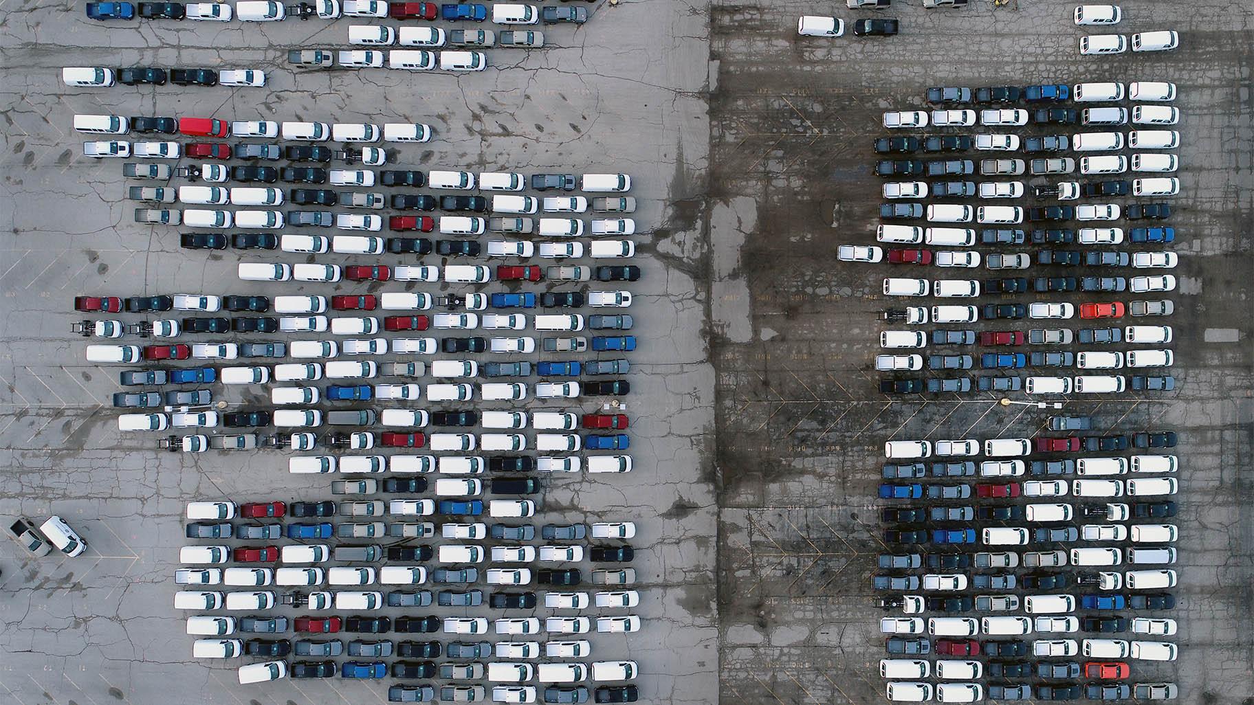 In this aerial photo, mid-sized pickup trucks and full-size vans are seen in a parking lot outside a General Motors assembly plant where they are produced Wednesday, March 24, 2021, in Wentzville, Mo. (AP Photo / Jeff Roberson)
