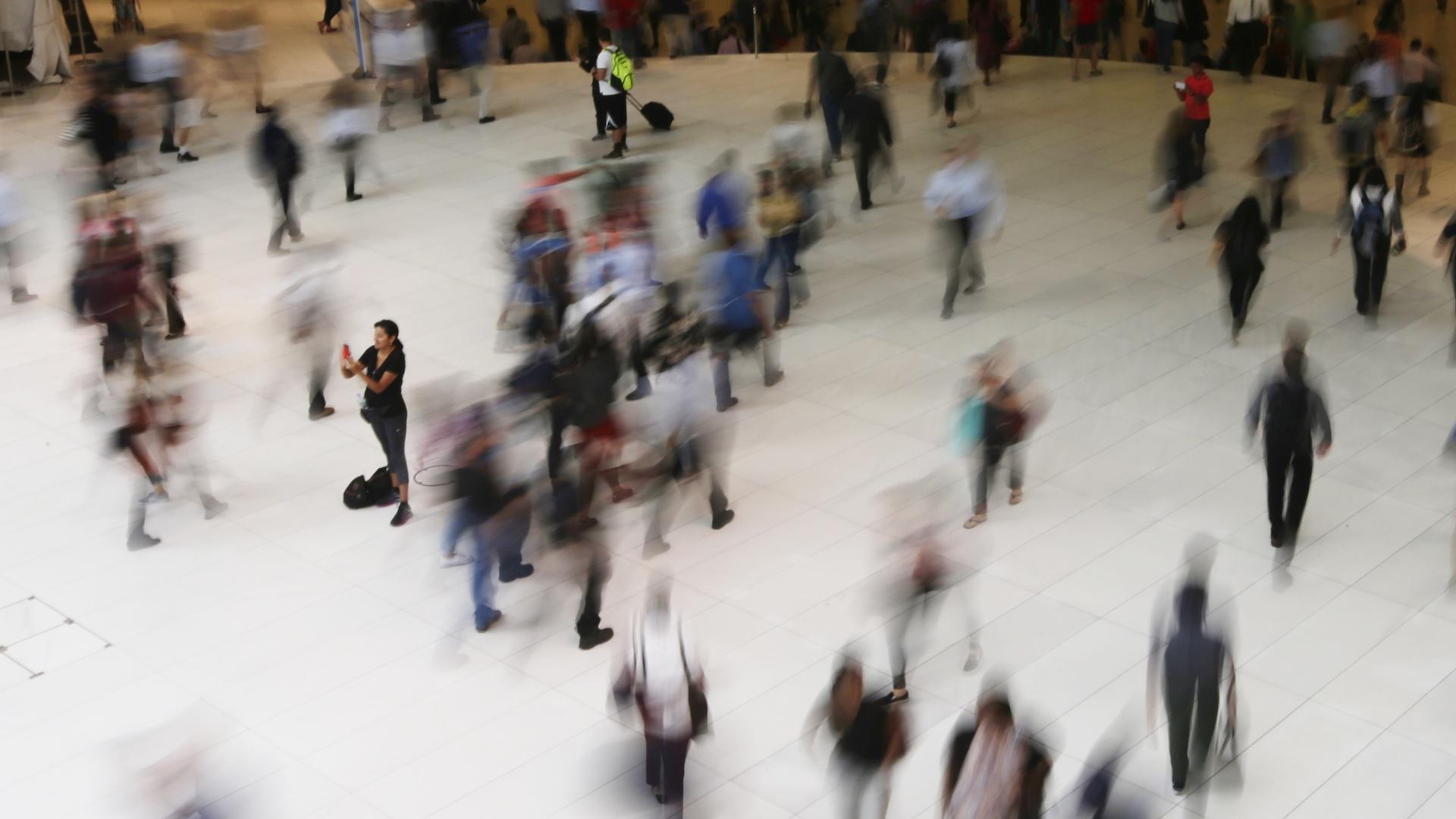 In this June 15, 2017 photo, people walk inside the Oculus in New York. Google has agreed to a $391.5 million settlement with 40 states in connection with an investigation into how the company tracked users’ locations. (AP Photo/Frank Franklin II, File)