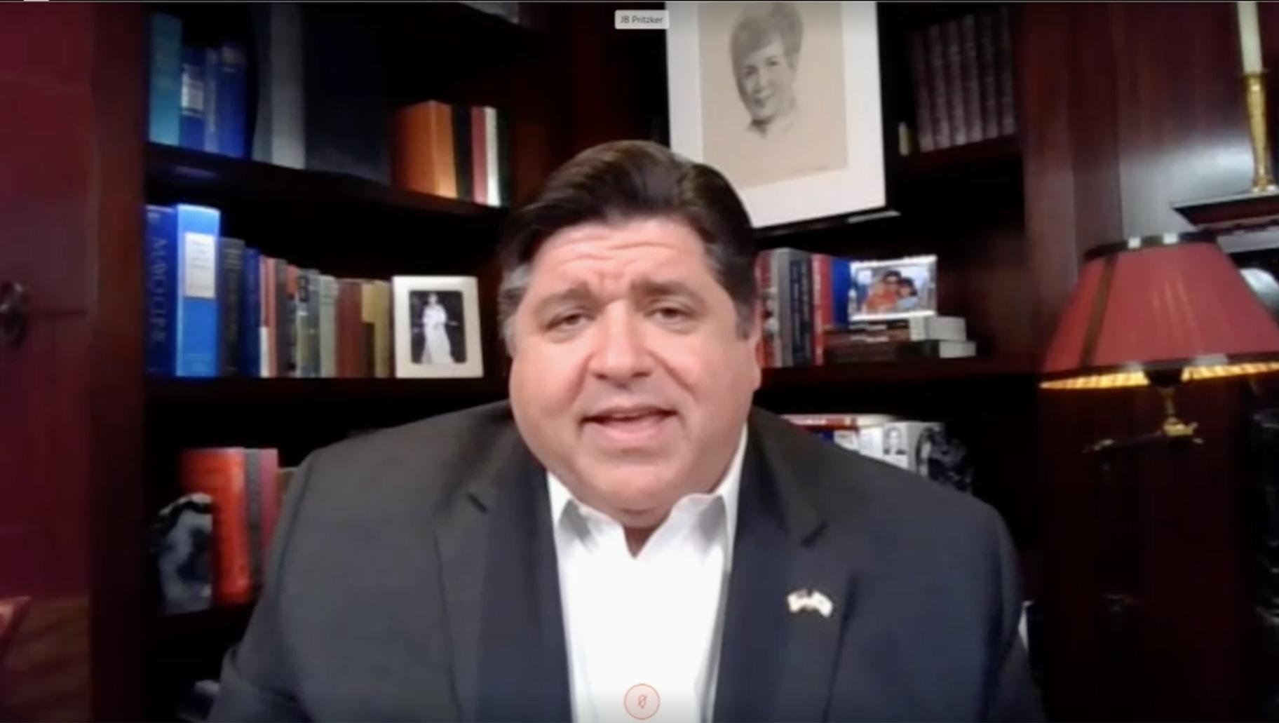 A screenshot shows Illinois Gov. J.B. Pritzker holding a press briefing from his Chicago home on Monday, May 11, 2020. The governor is staying home after senior member of his staff tested positive for the coronavirus.