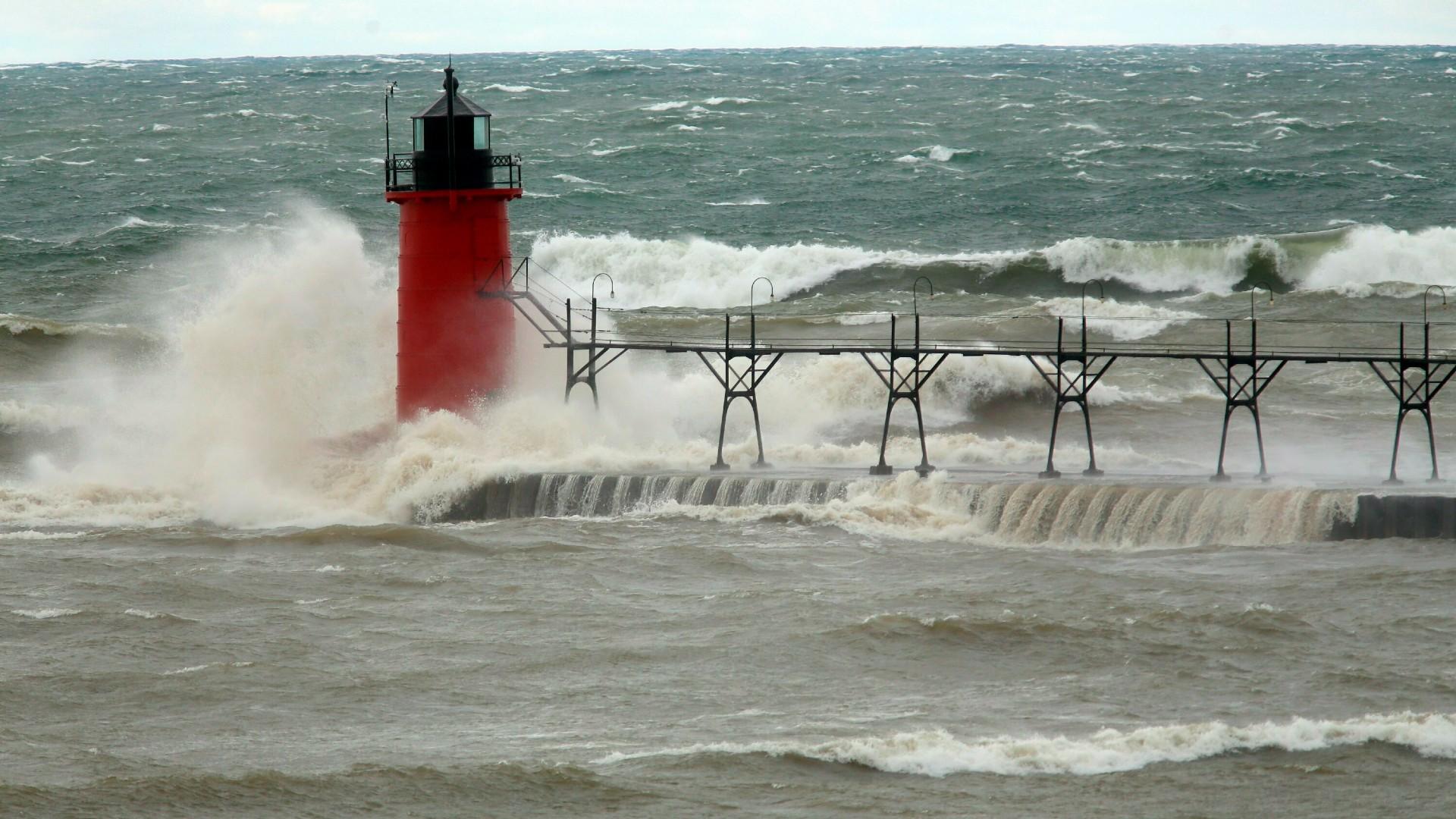 In this April 6, 2017 file photo, strong winds send huge waves at the Lake Michigan shoreline at South Haven Michigan. (Mark Bugnaski / Kalamazoo Gazette via AP, File)