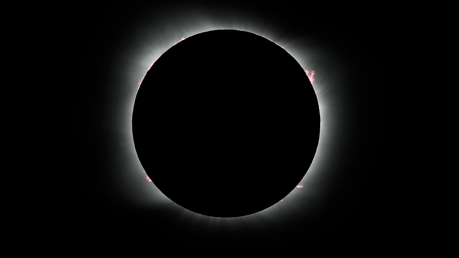  The moon covers the sun during a solar eclipse in Piedra del Aguila, Argentina, Monday, Dec. 14, 2020. (AP Photo / Natacha Pisarenko)