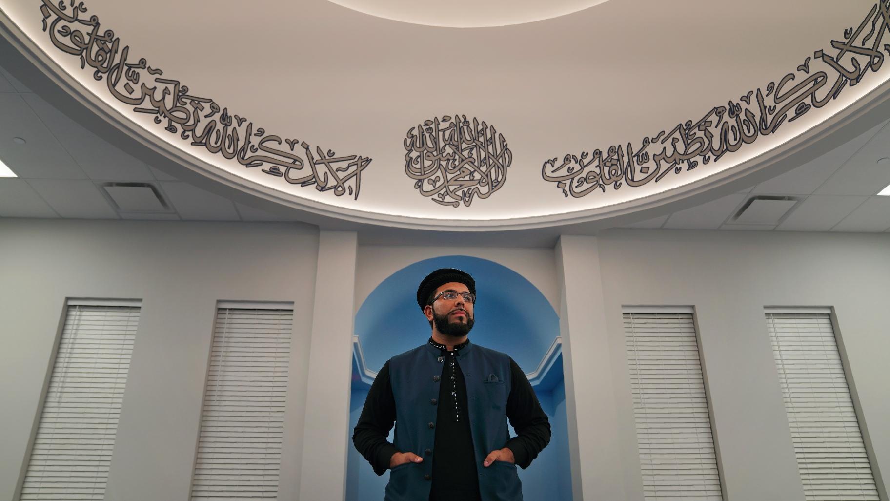 Tariq Naseem, imam for the Zion Ahmadiyya Muslim community, stands for a portrait in the newly constructed Fath-e-Azeem mosque in Zion, Ill., on Thursday, Sept. 15, 2022. (AP Photo/Jessie Wardarski)