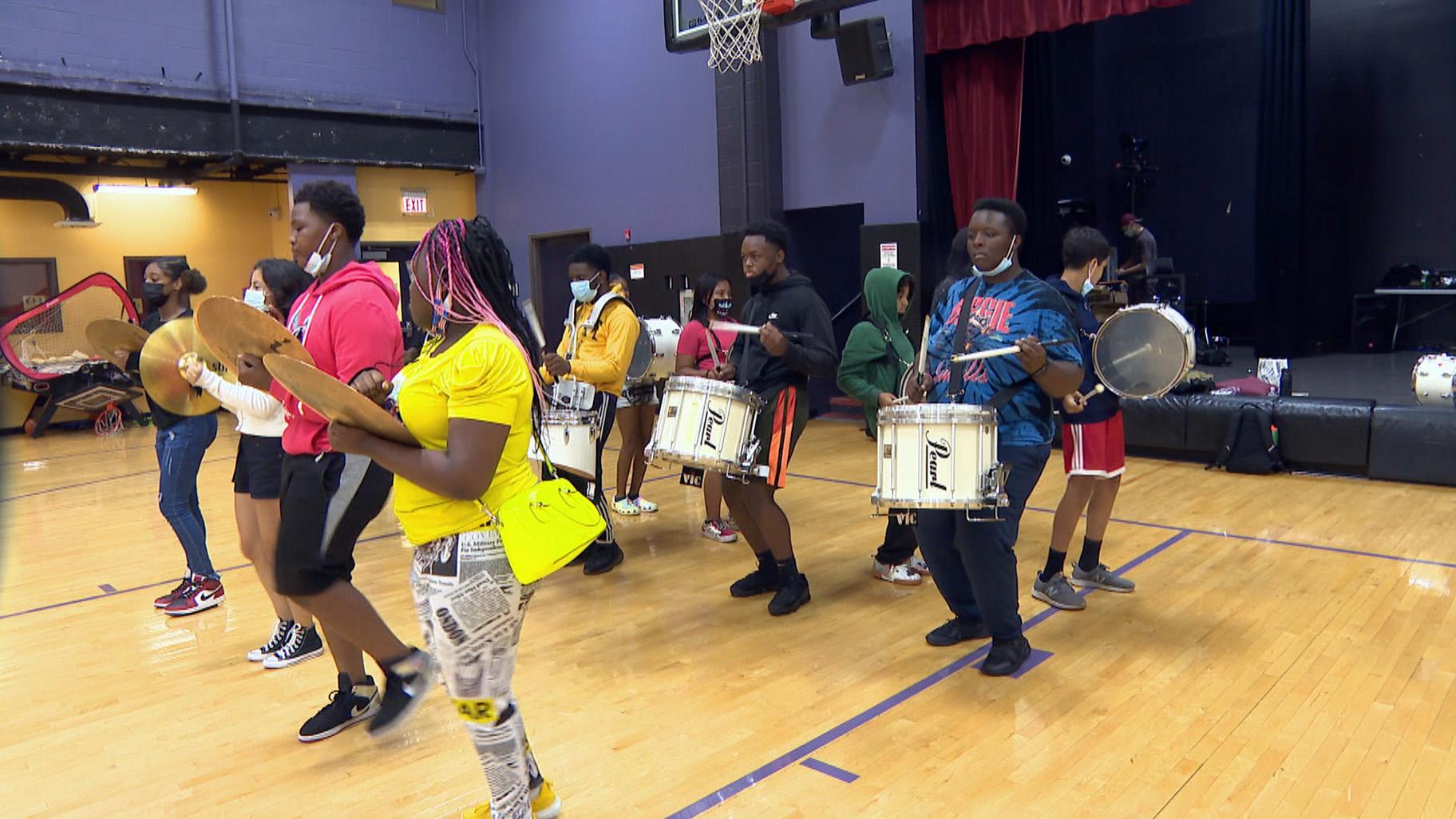 Hope Junior Drumline and WestDance have been practicing three hours a day, five days a week since late June to prepare for their performance at Lollapalooza. (WTTW News)