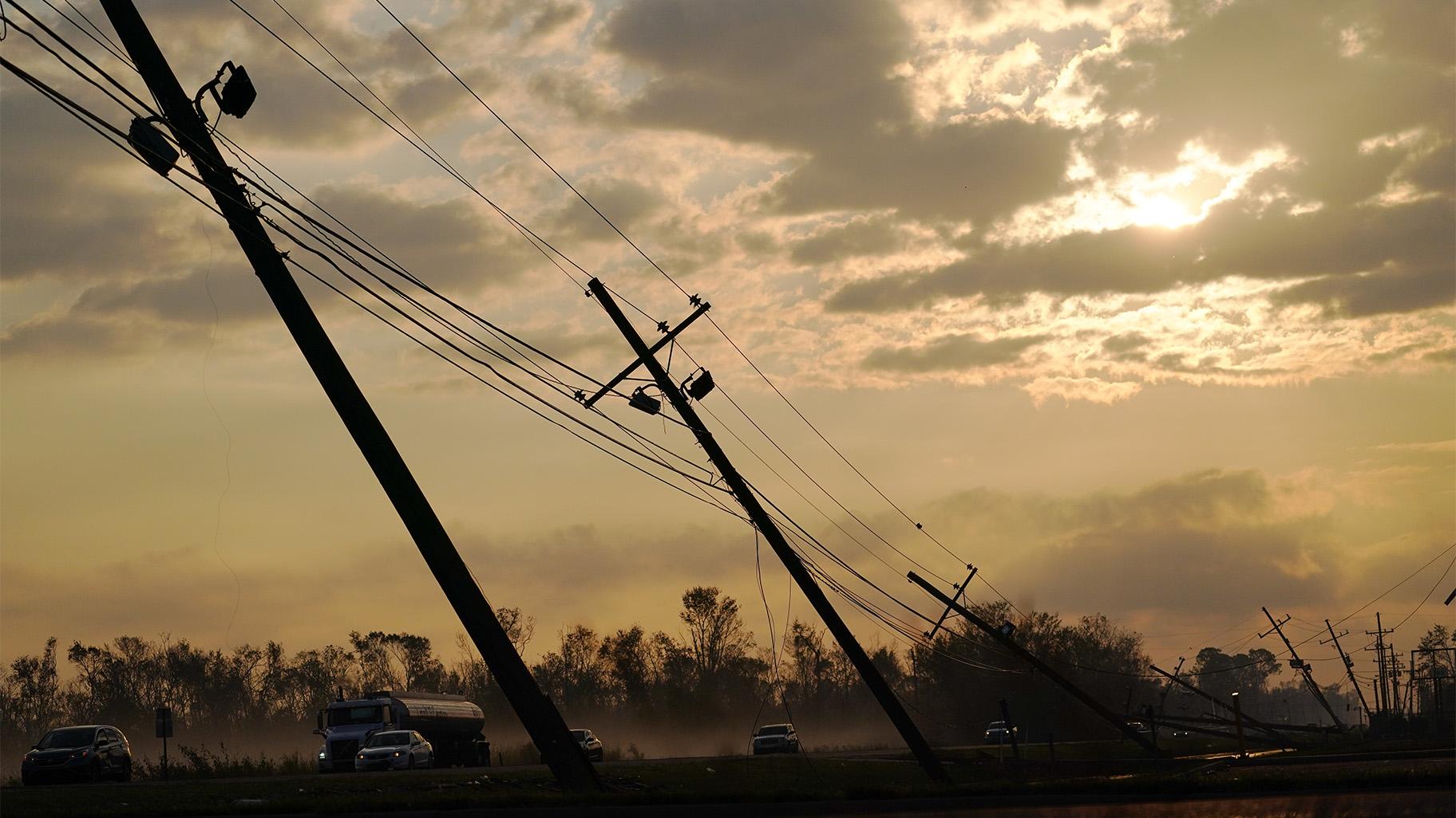Downed power lines slump over a road in the aftermath of Hurricane Ida, Friday, Sept. 3, 2021, in Reserve, La. (AP Photo / Matt Slocum)