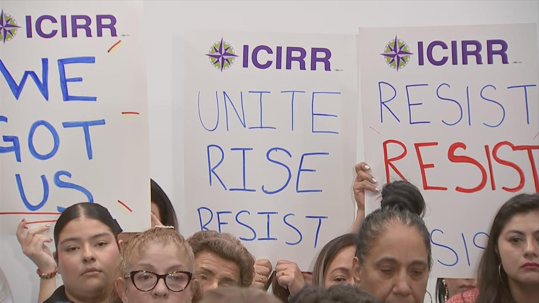 Signs during a post-election news conference held by members of local immigrant rights groups on Nov. 6, 2024, in light of Donald Trump’s presidential election win. (WTTW News)
