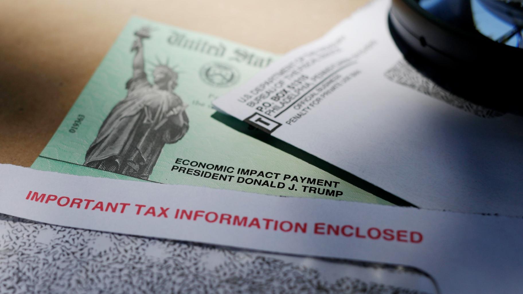 FILE - President Donald Trump's name is seen on a stimulus check issued by the IRS to help combat the adverse economic effects of the COVID-19 outbreak, on April 23, 2020, in San Antonio. (AP Photo / Eric Gay, File)