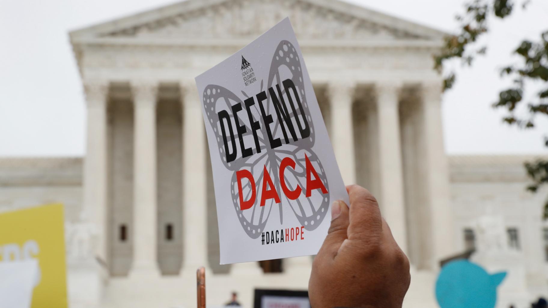 FILE - People rally outside the Supreme Court over President Trump's decision to end the Deferred Action for Childhood Arrivals program (DACA), at the Supreme Court in Washington, Nov. 12, 2019. (AP Photo / Jacquelyn Martin, File)