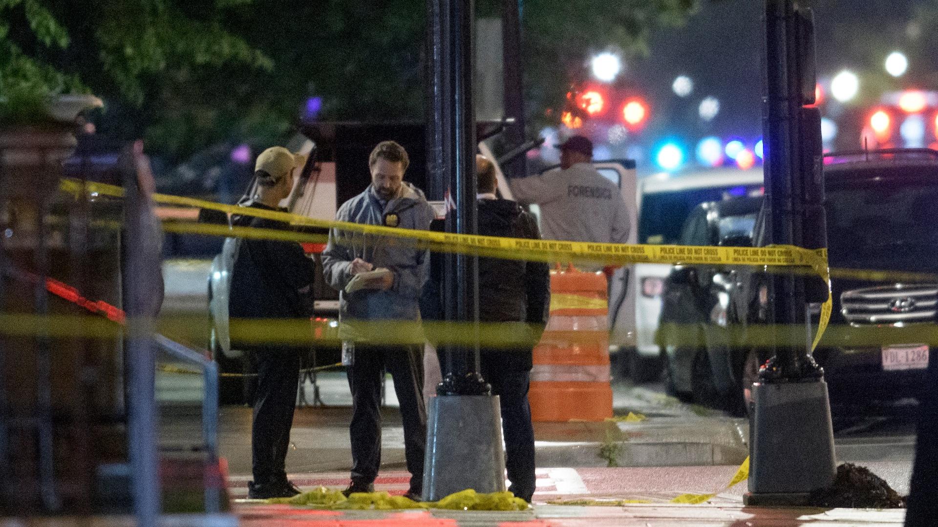 Law enforcement work the scene after two staff members of the Israeli Embassy in Washington were shot and killed outside the Capital Jewish Museum, Thursday, May 22, 2025, in Washington. (AP Photo/Rod Lamkey, Jr.)
