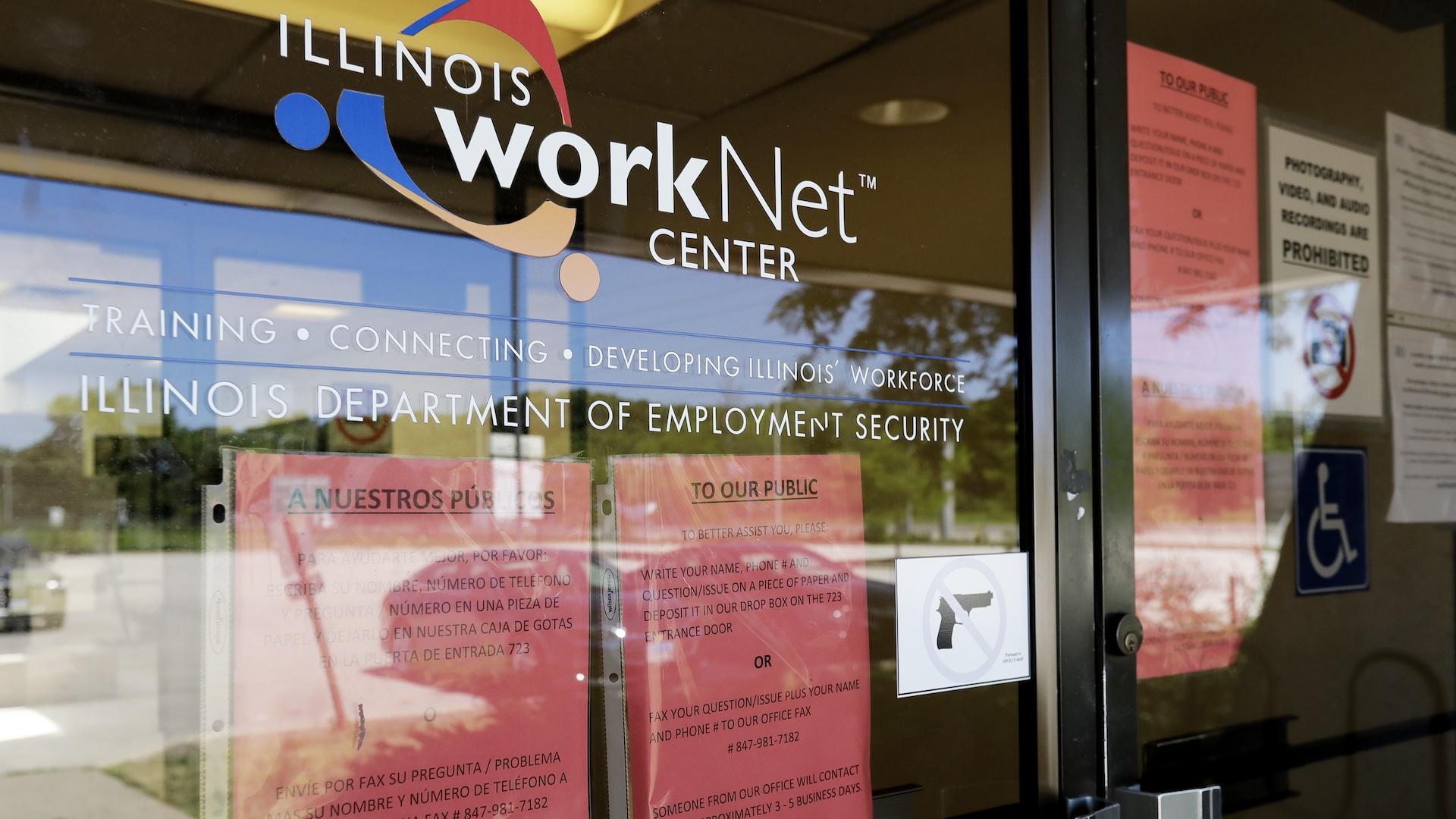 In this June 11, 2020, file photo, information signs are displayed at the closed Illinois Department of Employment Security WorkNet center in Arlington Heights, Ill. U.S. employers advertised for slightly fewer jobs in August while their hiring ticked up modestly. (AP Photo/Nam Y. Huh, File)