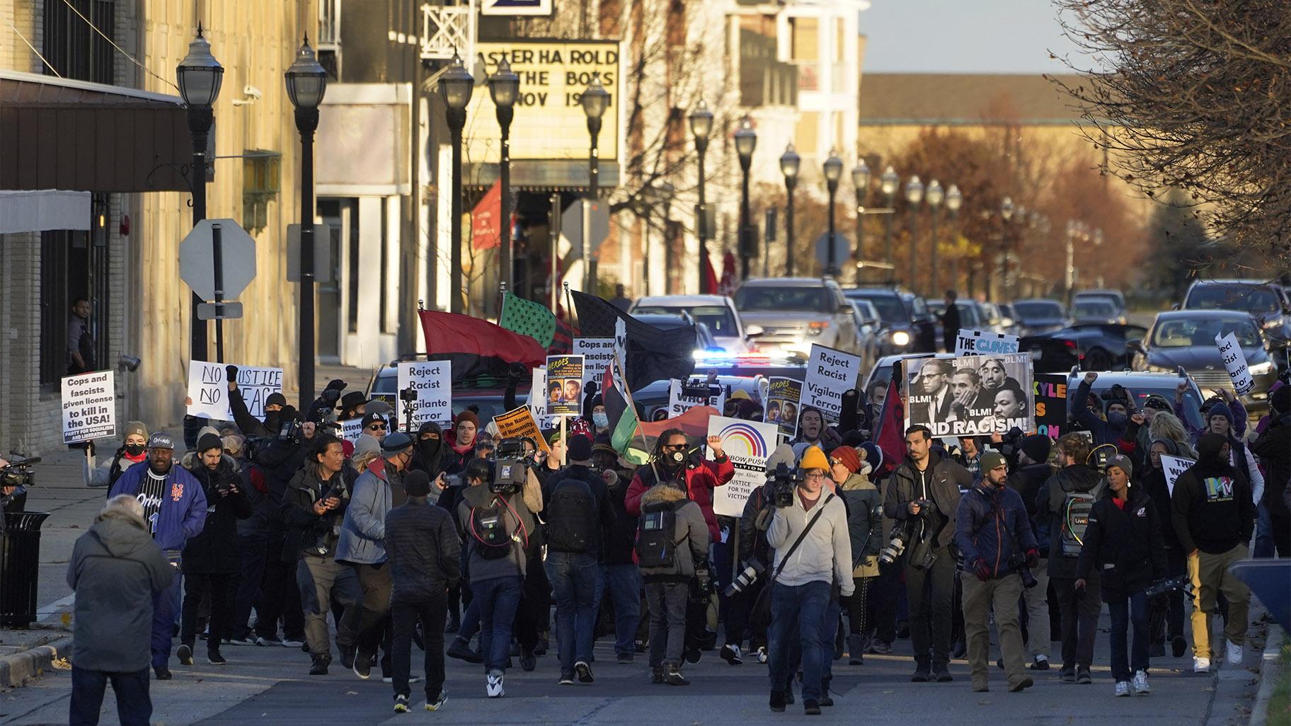 Protesters march, Sunday, Nov. 21, 2021, in Kenosha, Wis. Kyle Rittenhouse was acquitted of all charges after pleading self-defense in the deadly Kenosha shootings that became a flashpoint in the nation's debate over guns, vigilantism and racial injustice. (AP Photo / Paul Sancya)