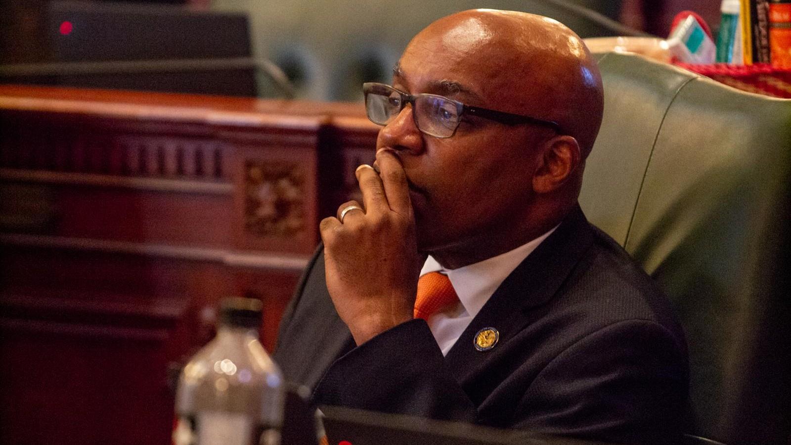 Illinois Attorney General Kwame Raoul listens during a May 2023 House floor debate of a bill subjecting gun dealers and manufacturers to civil action if they use deceptive marketing practices. (Jerry Nowicki / Capitol News Illinois)