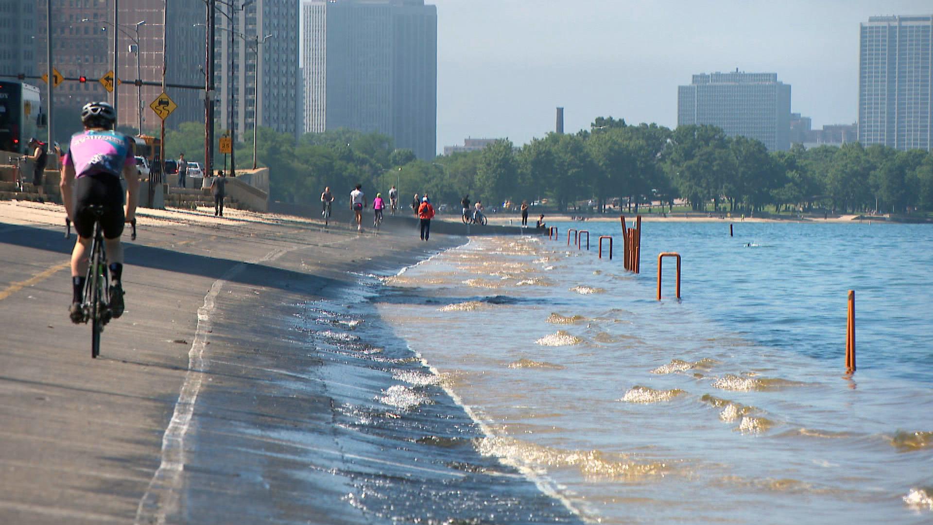 Lake Michigan waves cover Chicago’s lakefront path in the summer of 2019. (WTTW News)