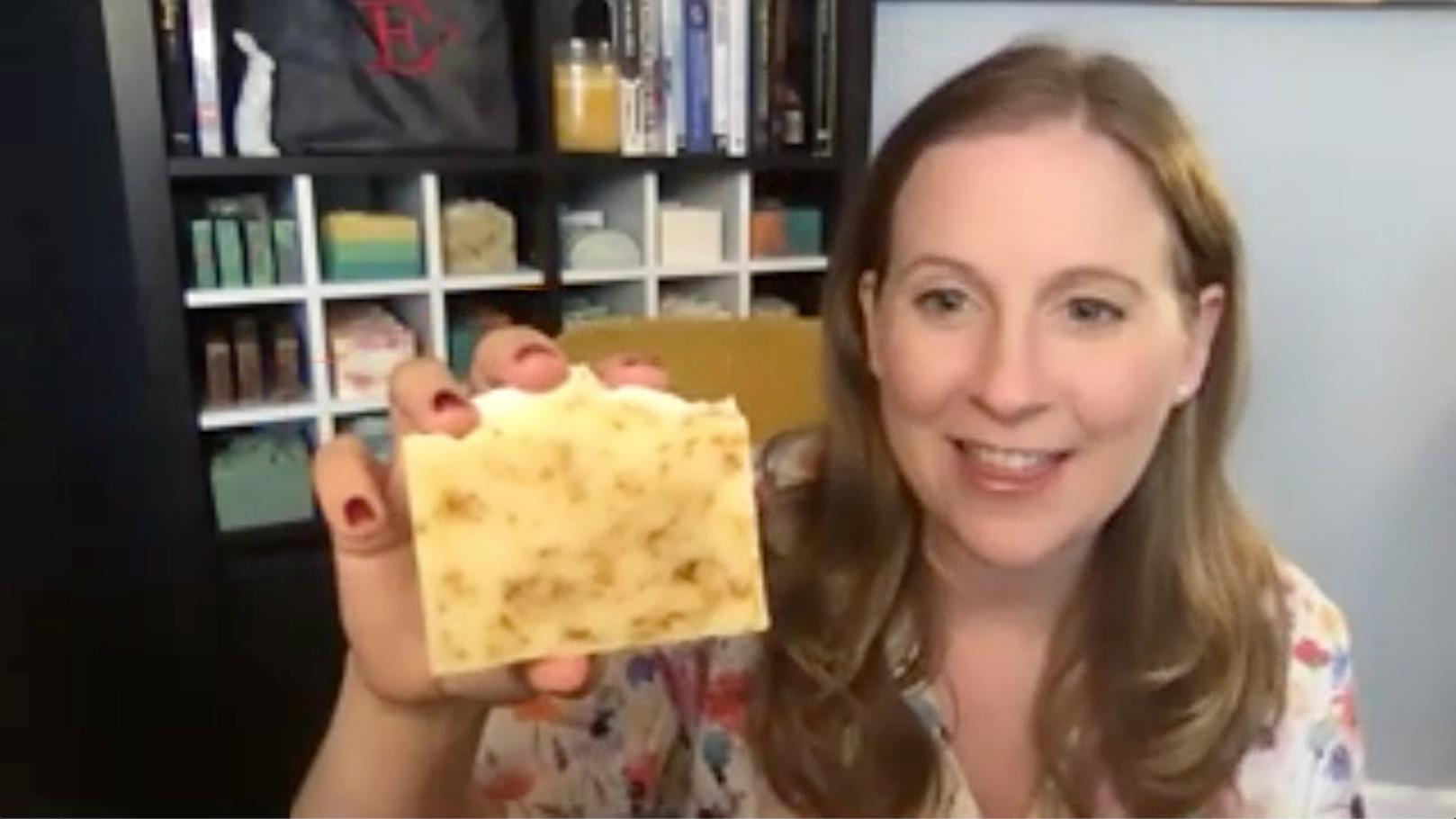 Dr. Emily Landon holds up a bar of soap she made. The infectious disease expert has been making soaps and candles for years. (WTTW News)