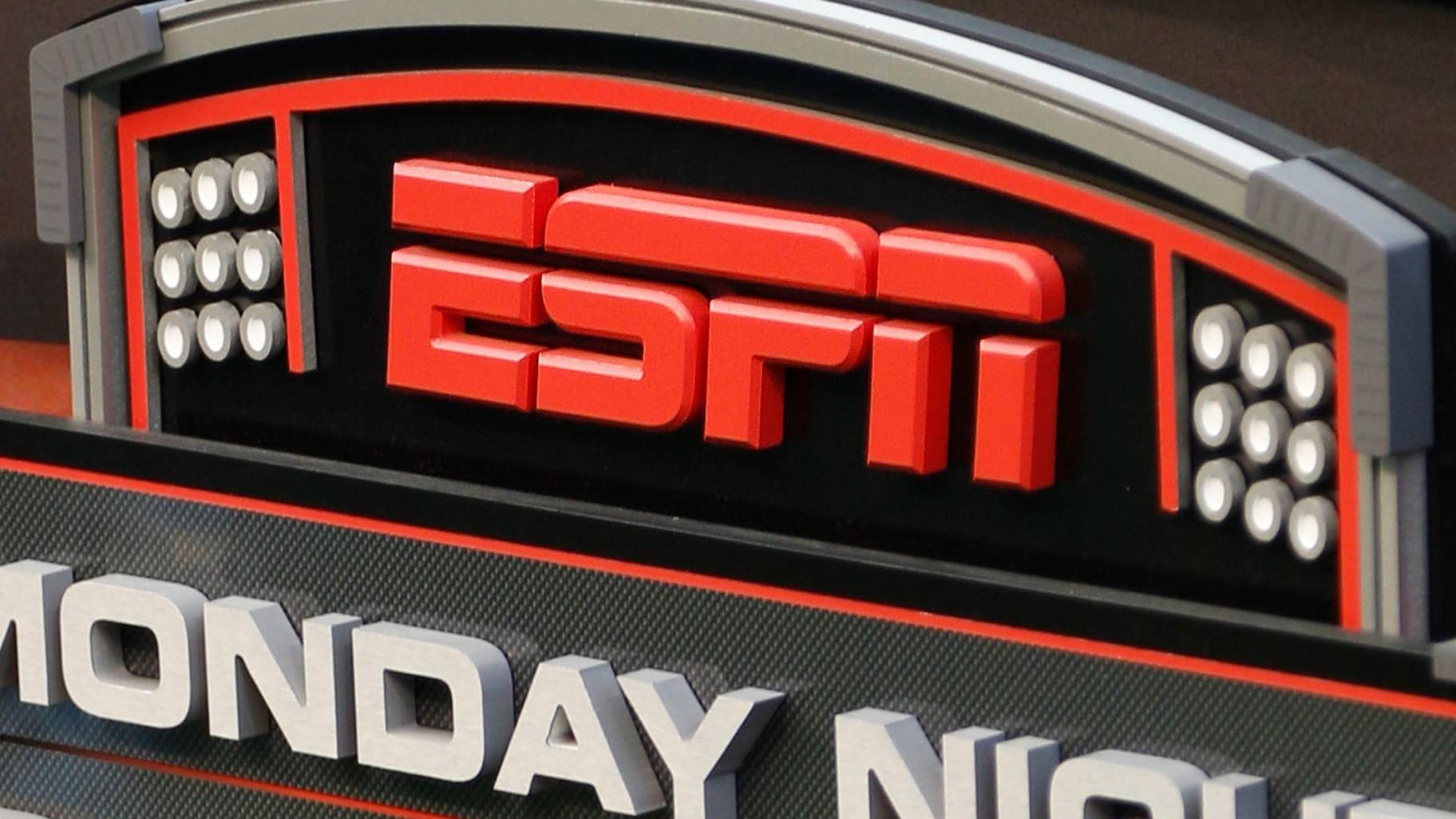 The ESPN logo is seen, Sept. 16, 2013, prior to an NFL football game between the Cincinnati Bengals and the Pittsburgh Steelers in Cincinnati. (AP Photo / David Kohl, File)
