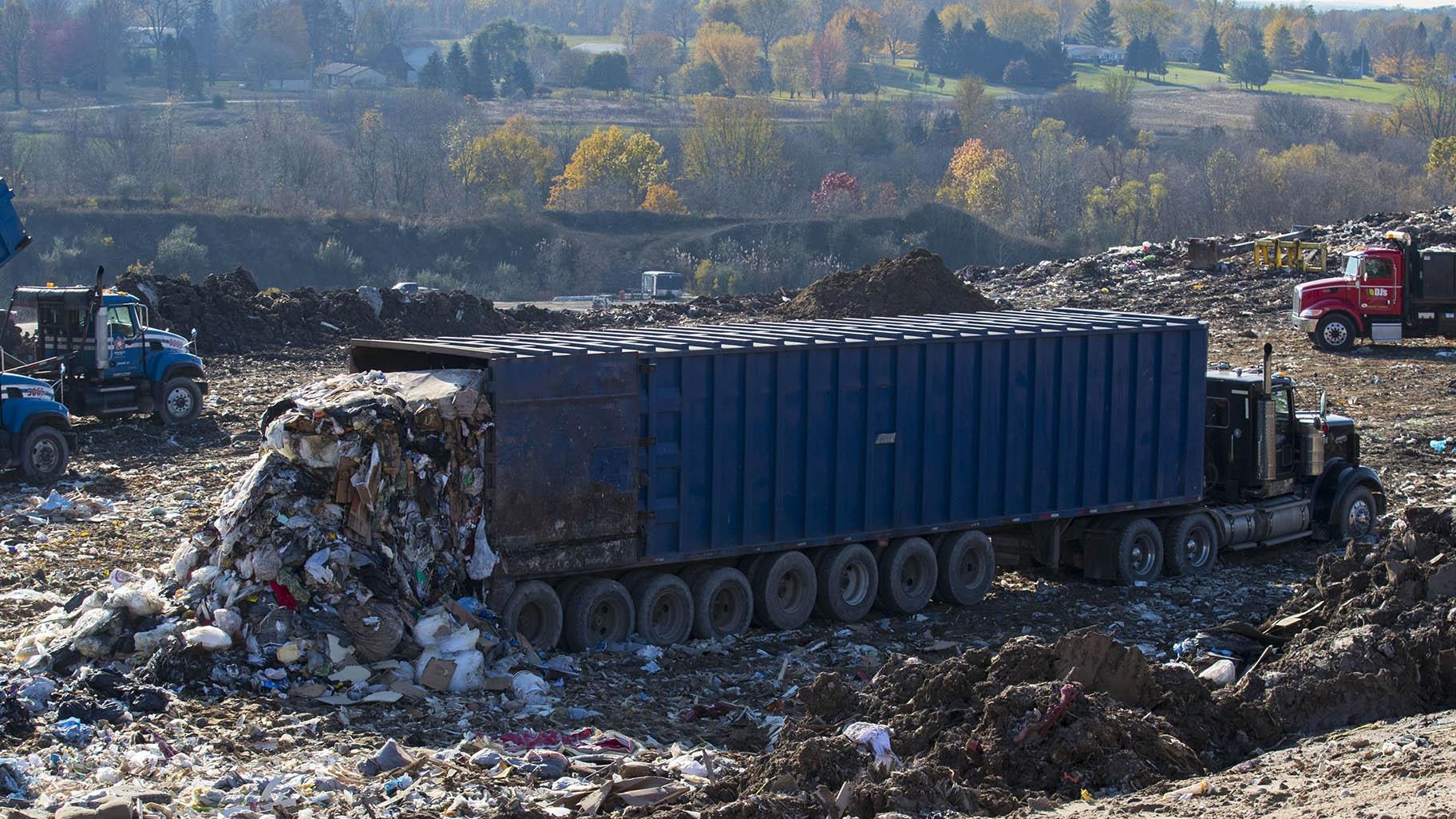 A truck drops off a load of garbage at the South Kent Landfill in Byron Township, Mich., on Wednesday, Nov. 8, 2017. (Mike Clark / The Grand Rapids Press via AP, File)
