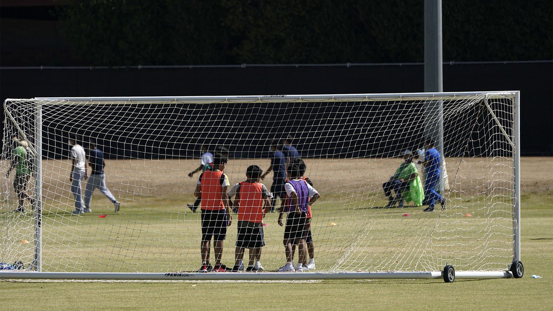 Children play soccer at an emergency shelter for migrant children Friday, July 2, 2021, in Pomona, Calif. (AP Photo / Marcio Jose Sanchez, Pool)