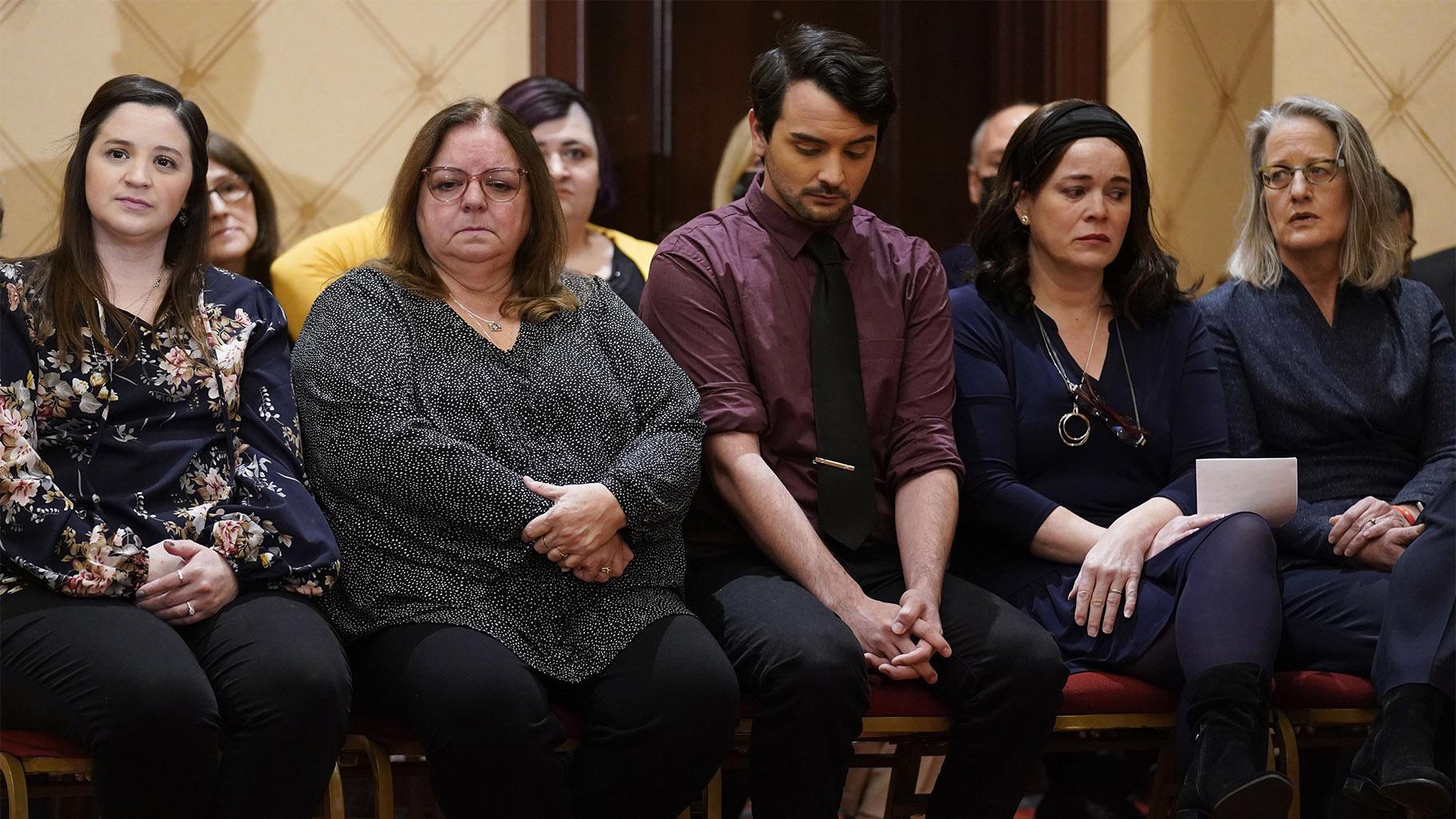 Families of the victims of the Newtown shooting and attorneys listen during a news conference in Trumbull, Conn., Tuesday, Feb. 15, 2022.  (AP Photo / Seth Wenig)