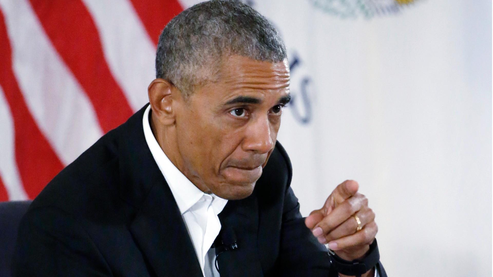 In this May 3, 2017 file photo, former President Barack Obama points as he arrives at a community event on the Presidential Center at the South Shore Cultural Center in Chicago. (AP Photo / Nam Y. Huh)