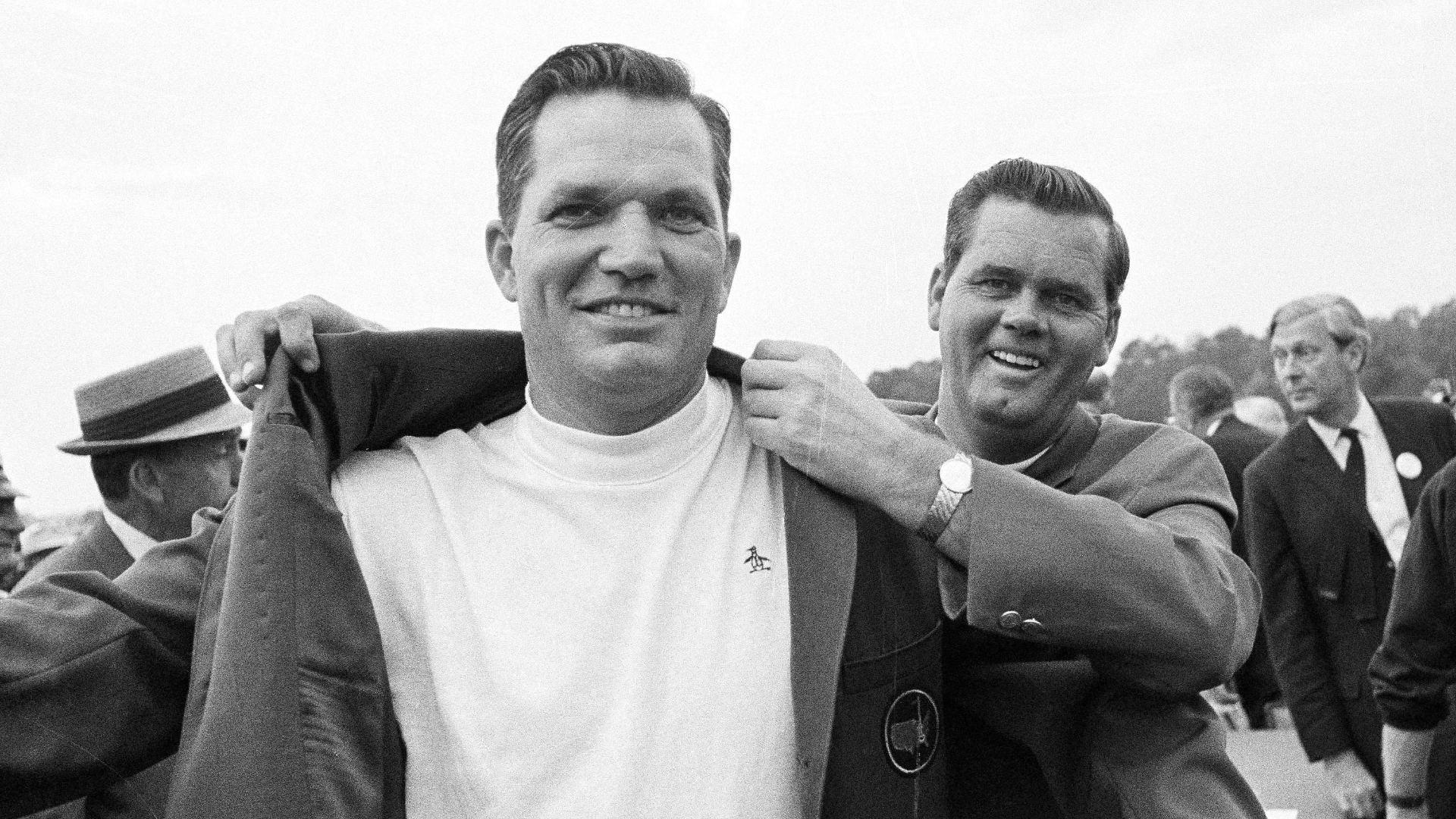 Bob Goalby gets the traditional green jacket as champion of the Masters golf tournament in Augusta, Ga., April 14, 1968, from the previous year's winner, Gay Brewer. (AP Photo, File)