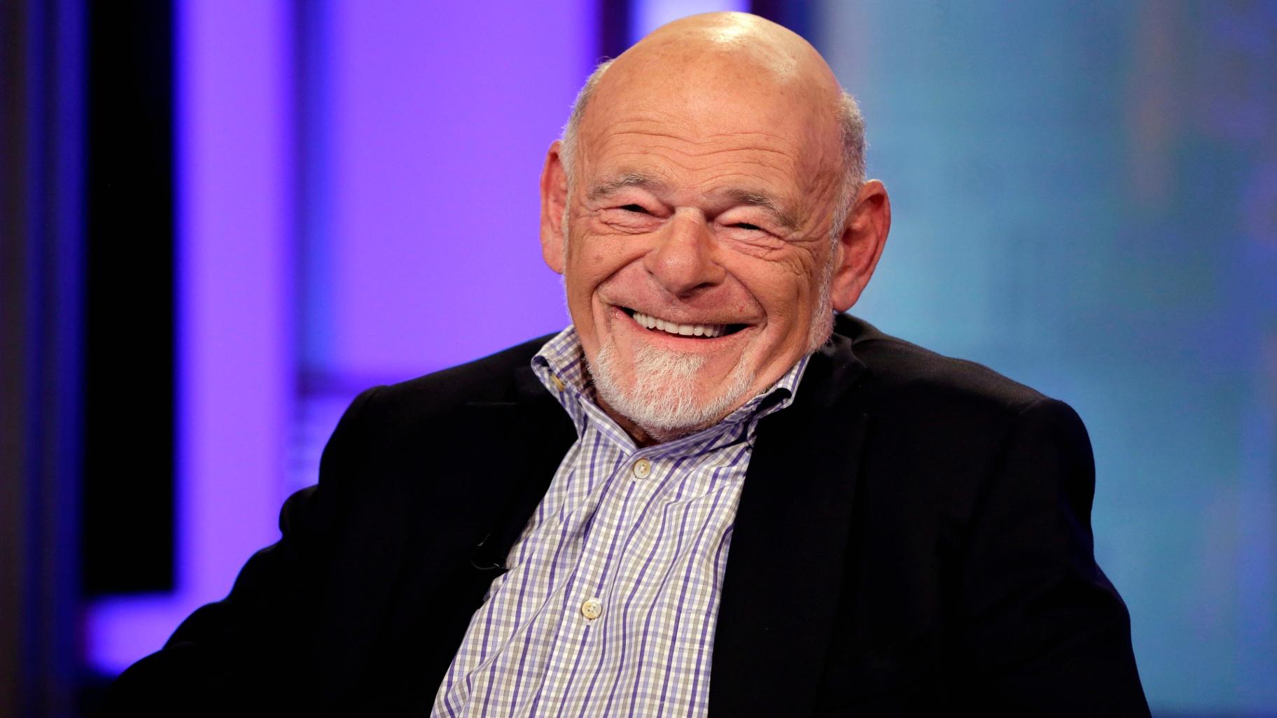 Sam Zell, chairman of Equity Group Investments, and chairman of Equity International, smiles during an interview by Neil Cavuto, on the Fox Business Network, in New York, on Aug. 6, 2013. (AP Photo / Richard Drew, File)